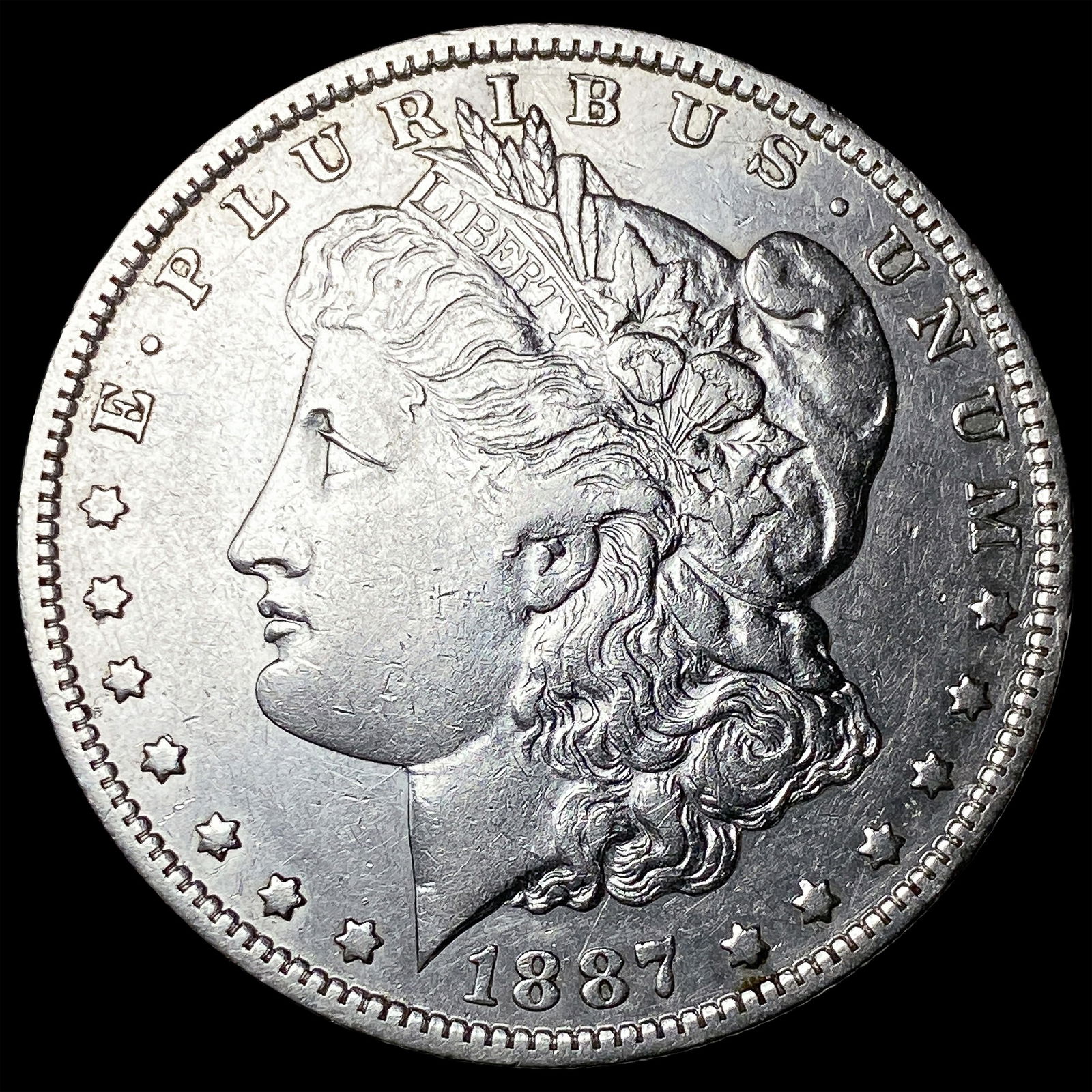1887-O Silver Morgan Dollar CLOSELY UNCIRCULATED: 1887-O Silver Morgan Dollar CLOSELY UNCIRCULATED