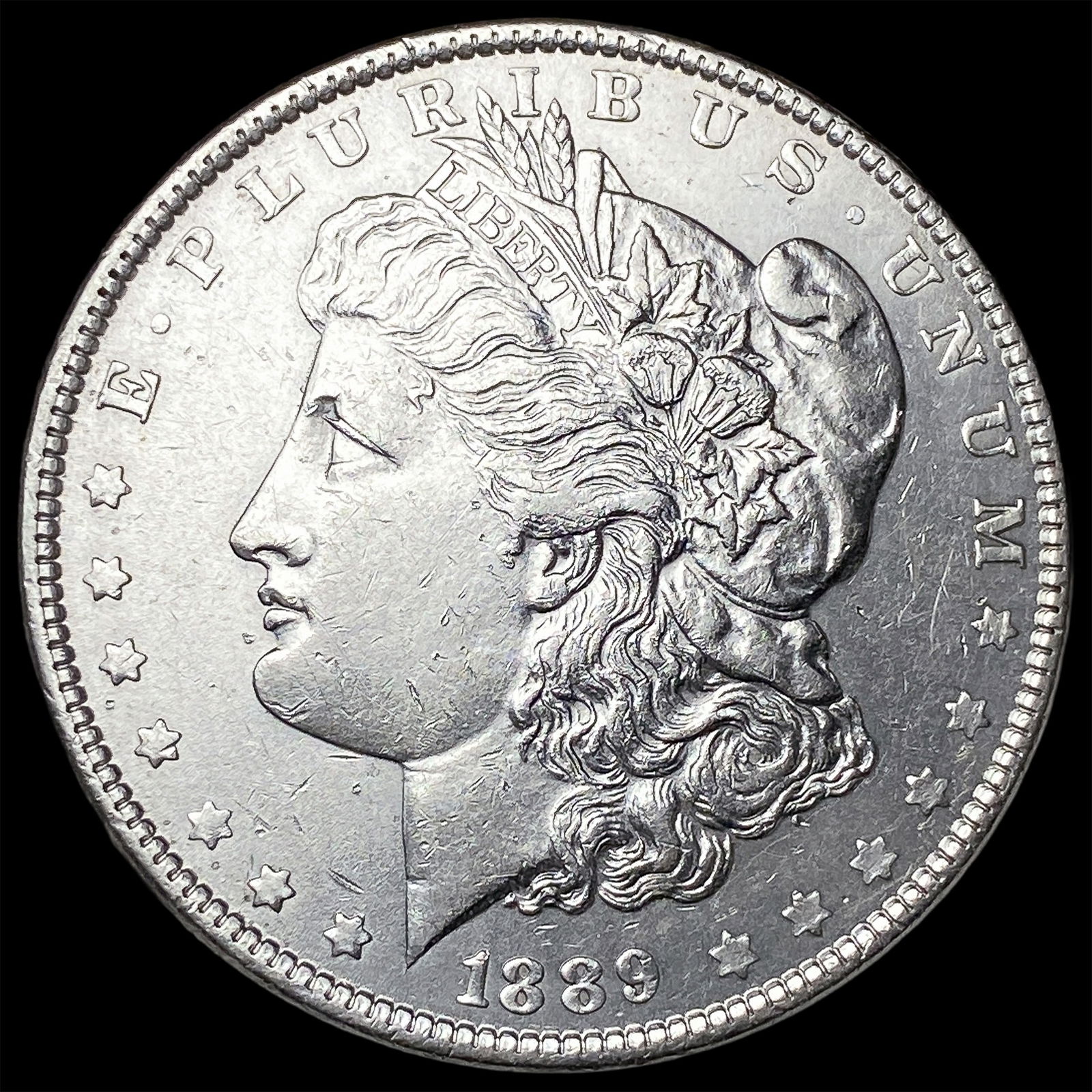 1889 Morgan Silver Dollar CLOSELY UNCIRCULATED (1 of 2)