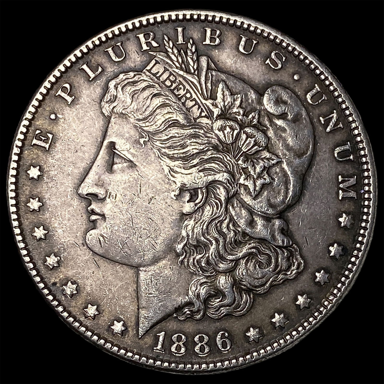 1886 Silver Morgan Dollar CLOSELY UNCIRCULATED: 1886 Silver Morgan Dollar CLOSELY UNCIRCULATED