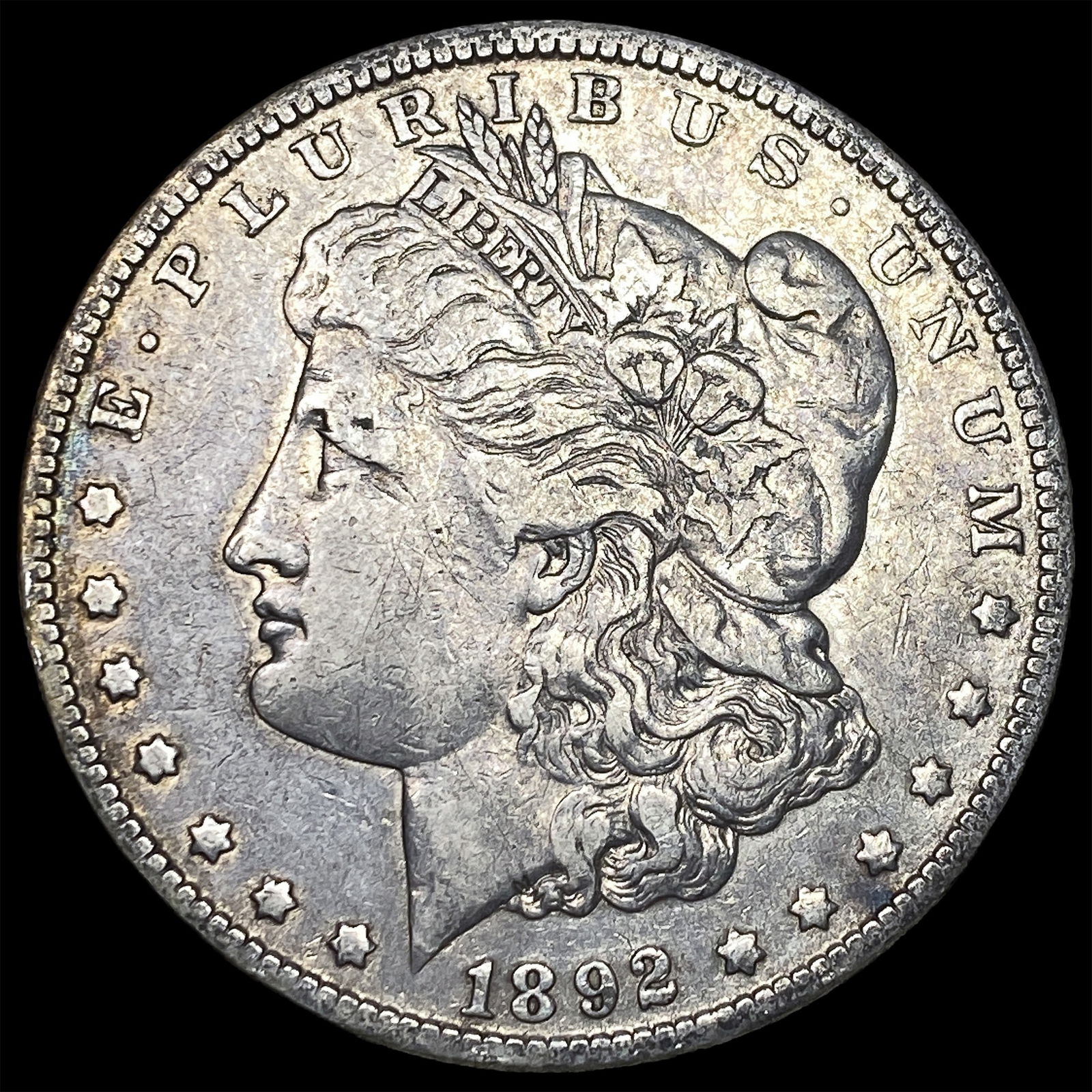 1892-O Silver Morgan Dollar ABOUT UNCIRCULATED: 1892-O Silver Morgan Dollar ABOUT UNCIRCULATED