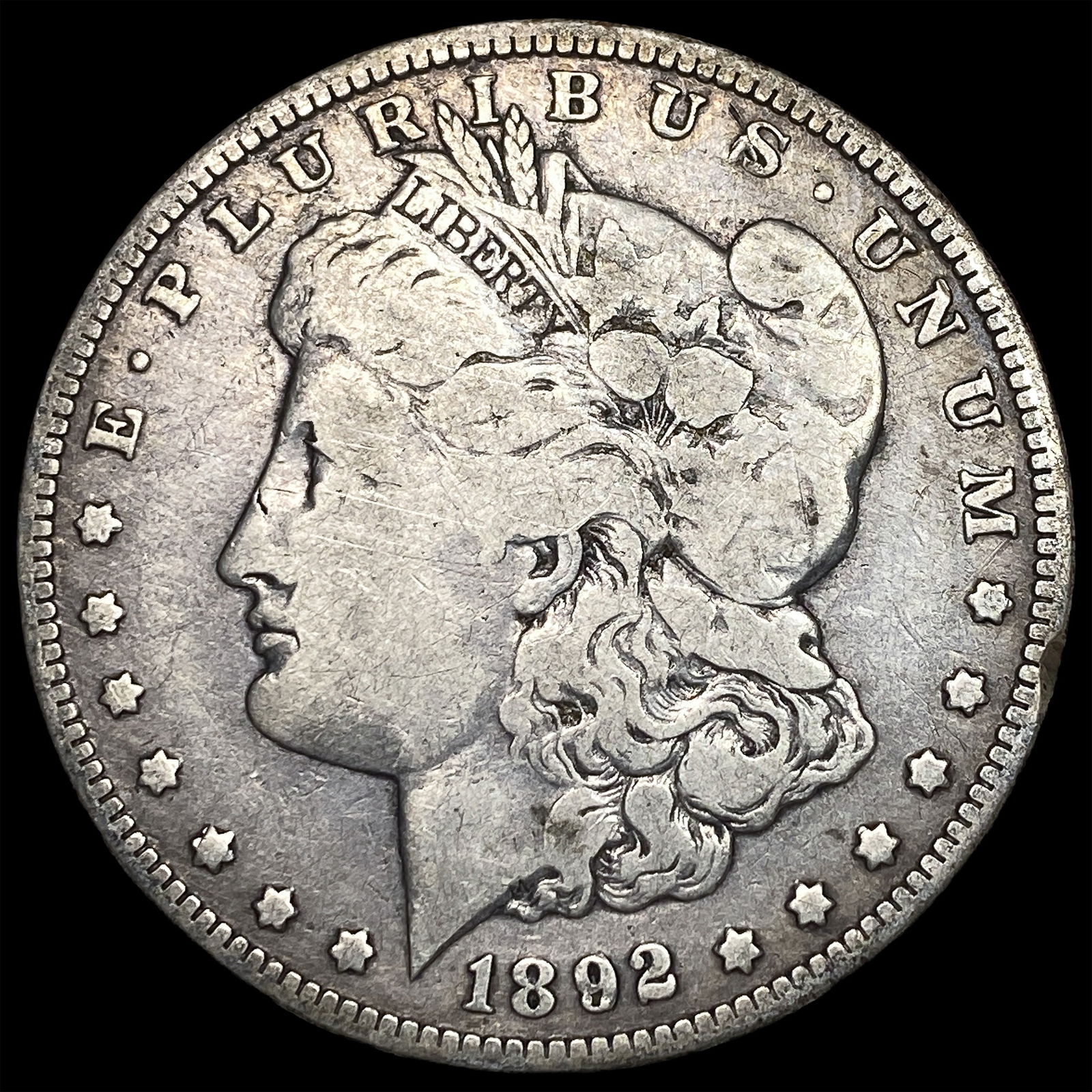 1892-O Silver Morgan Dollar ABOUT UNCIRCULATED: 1892-O Silver Morgan Dollar ABOUT UNCIRCULATED