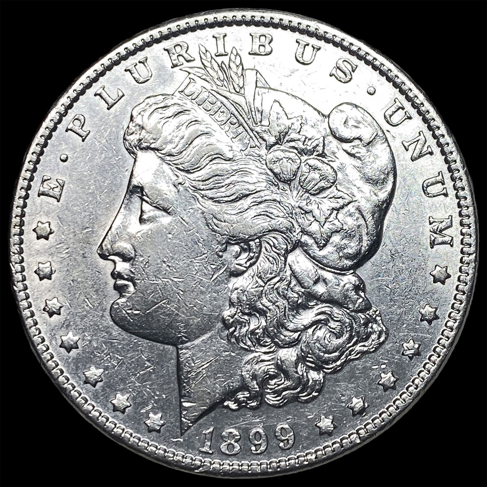 1899 Morgan Silver Dollar CLOSELY UNCIRCULATED: 1899 Morgan Silver Dollar CLOSELY UNCIRCULATED
