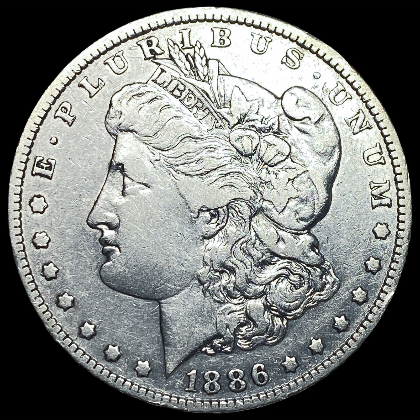1886-O Silver Morgan Dollar ABOUT UNCIRCULATED: 1886-O Silver Morgan Dollar ABOUT UNCIRCULATED