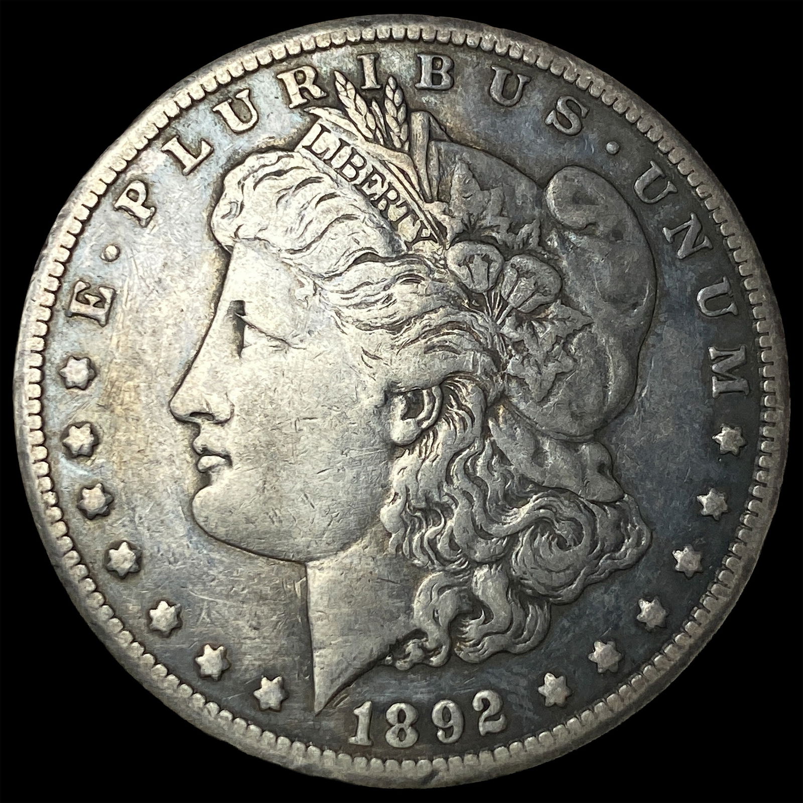 1892-CC Silver Morgan Dollar NEARLY UNCIRCULATED (1 of 2)