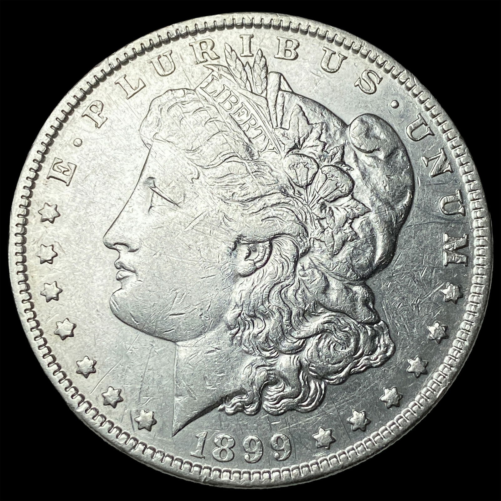 1899 Morgan Silver Dollar CLOSELY UNCIRCULATED: 1899 Morgan Silver Dollar CLOSELY UNCIRCULATED