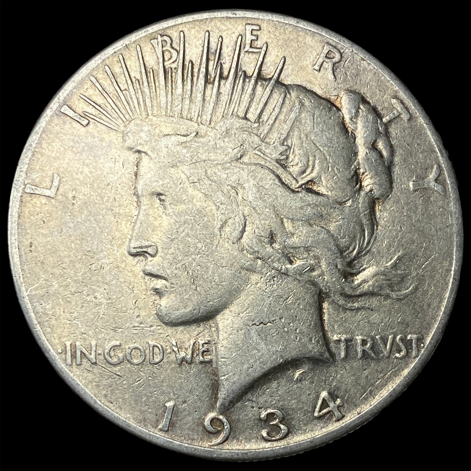 1934 Peace Silver Dollar ABOUT UNCIRCULATED: 1934 Peace Silver Dollar ABOUT UNCIRCULATED