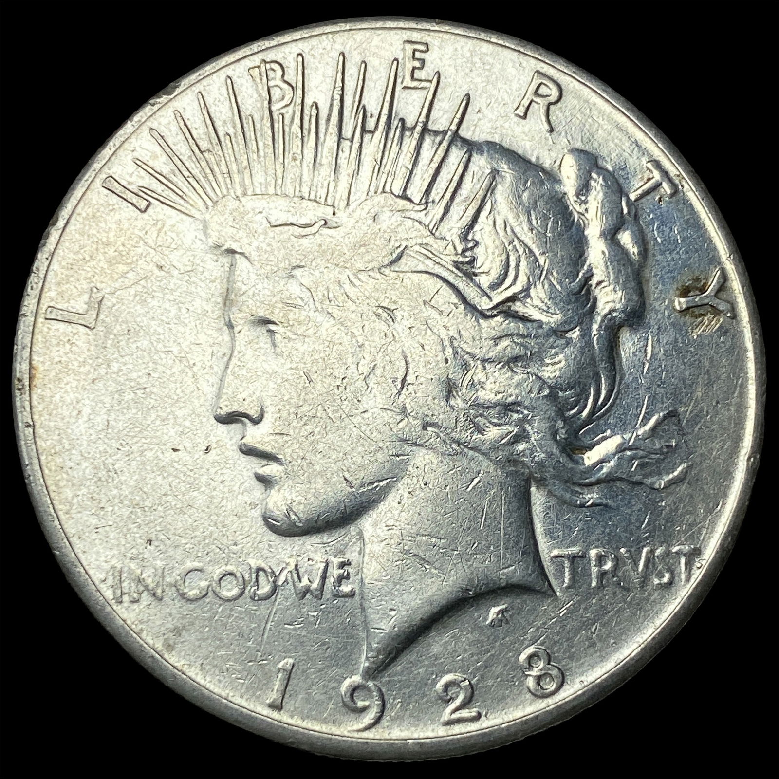 1928 Peace Silver Dollar ABOUT UNCIRCULATED (1 of 2)