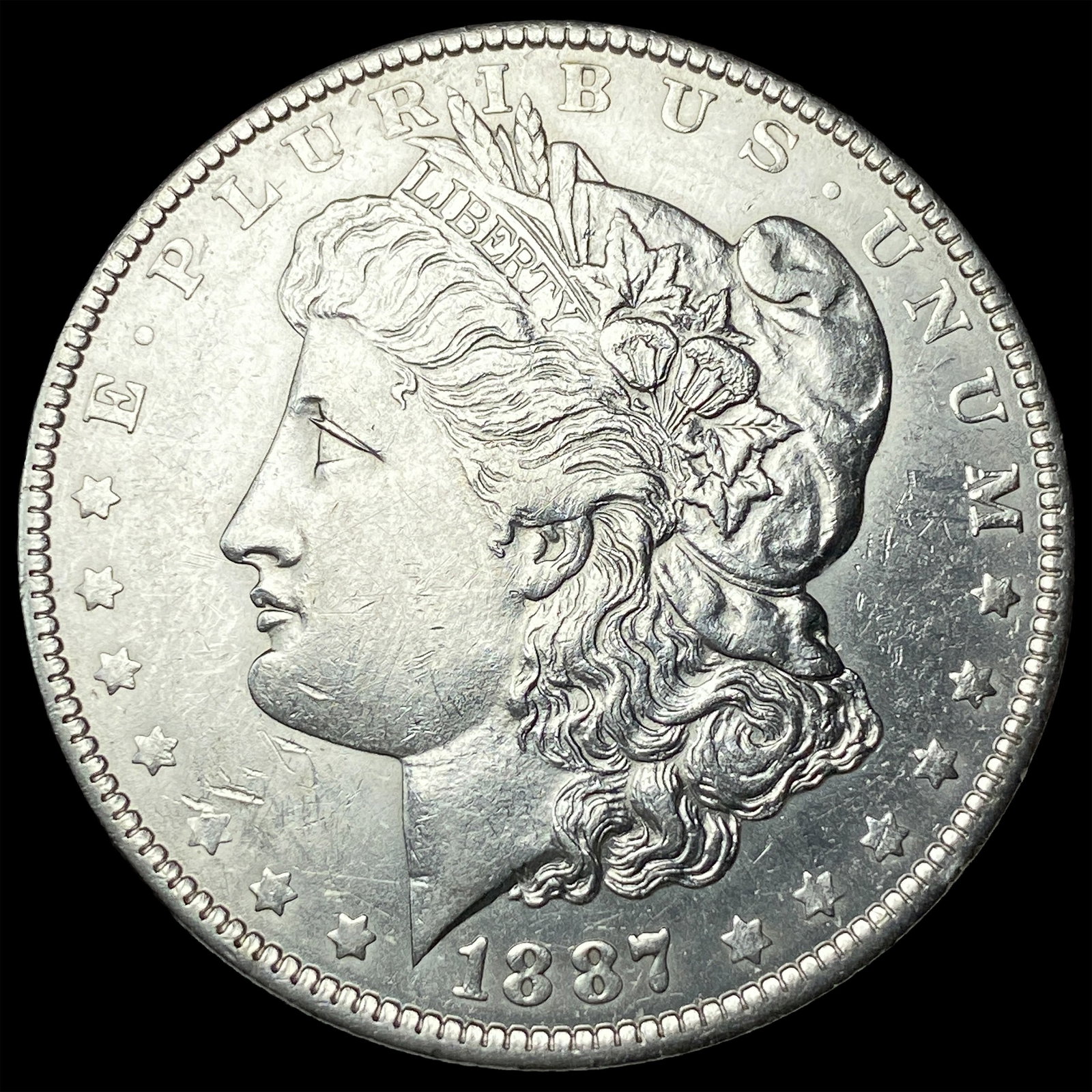 1887-O Silver Morgan Dollar CLOSELY UNCIRCULATED: 1887-O Silver Morgan Dollar CLOSELY UNCIRCULATED