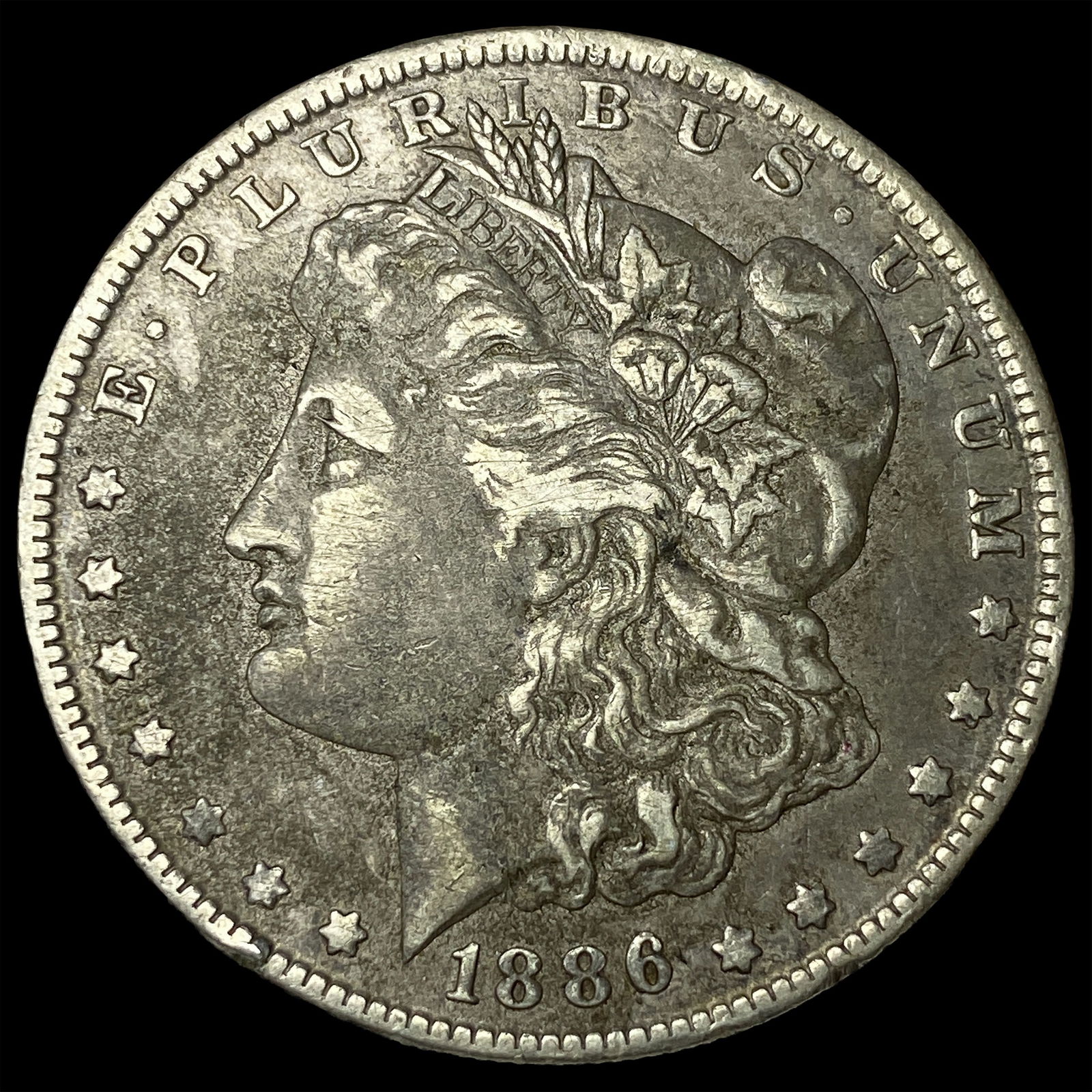 1886-O Silver Morgan Dollar NEARLY UNCIRCULATED: 1886-O Silver Morgan Dollar NEARLY UNCIRCULATED