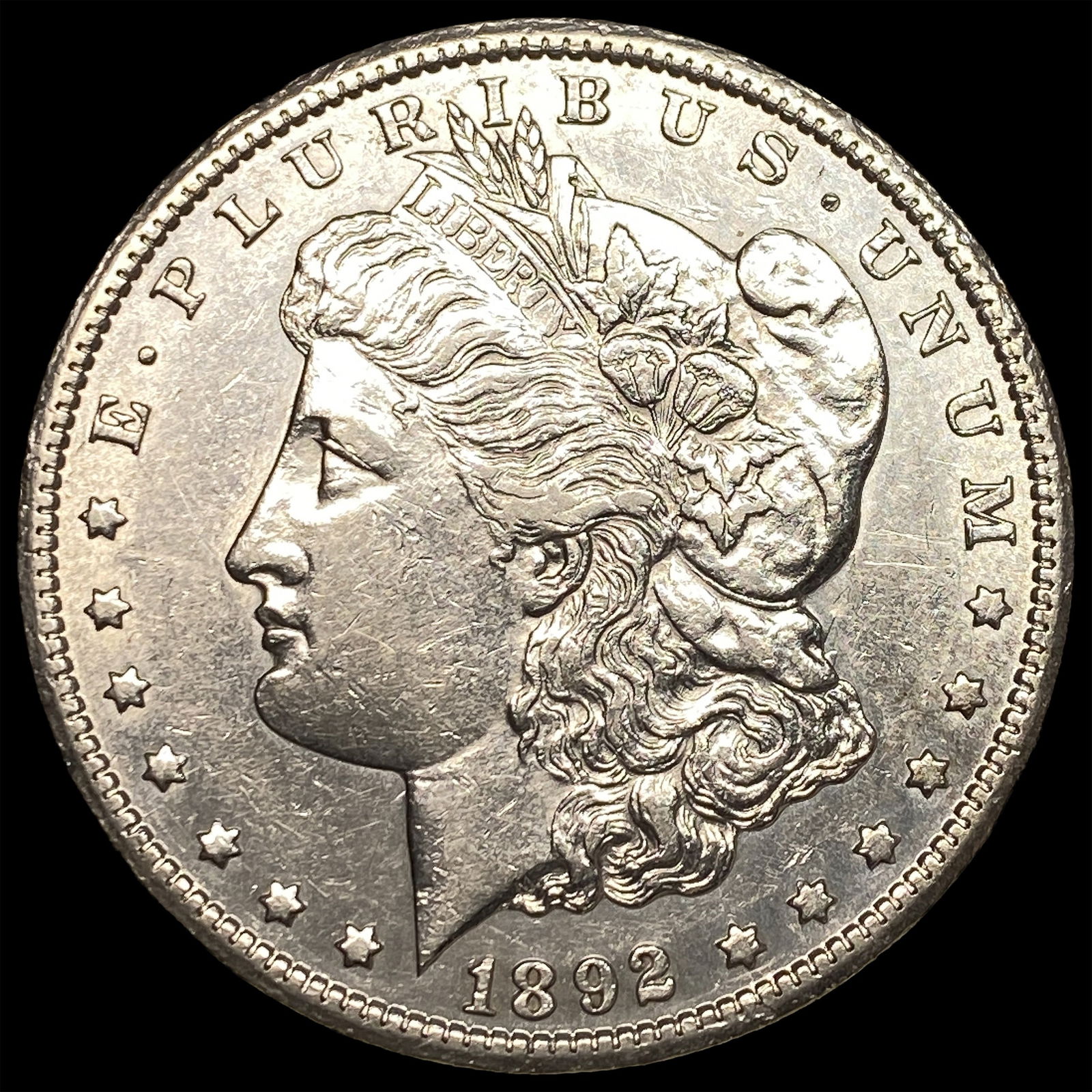 1892-CC Silver Morgan Dollar CLOSELY UNCIRCULATED: 1892-CC Silver Morgan Dollar CLOSELY UNCIRCULATED