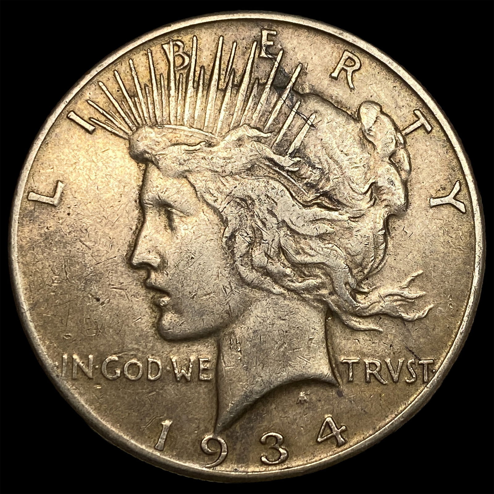 1934 Peace Silver Dollar ABOUT UNCIRCULATED: 1934 Peace Silver Dollar ABOUT UNCIRCULATED