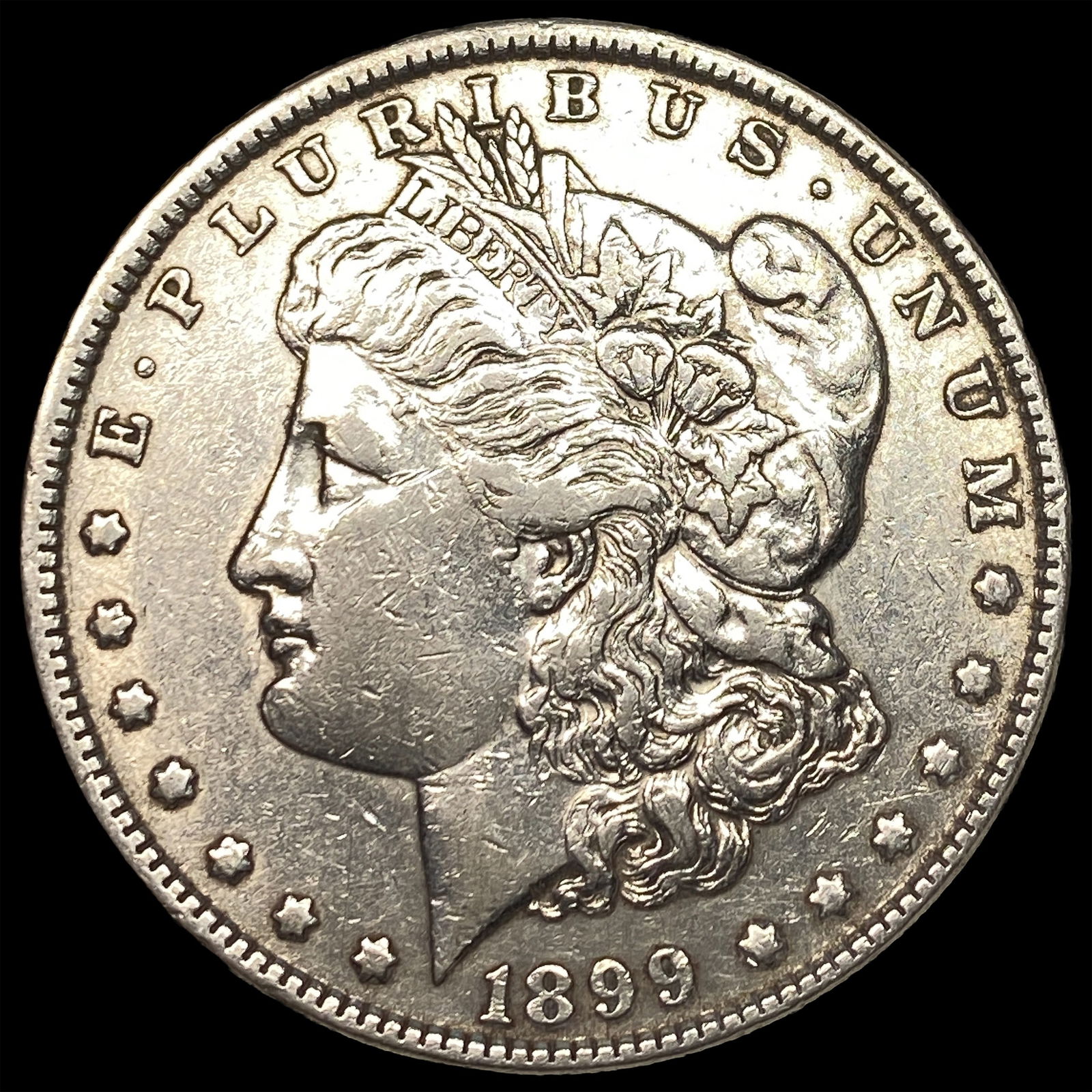 1899 Silver Morgan Dollar CLOSELY UNCIRCULATED: 1899 Silver Morgan Dollar CLOSELY UNCIRCULATED