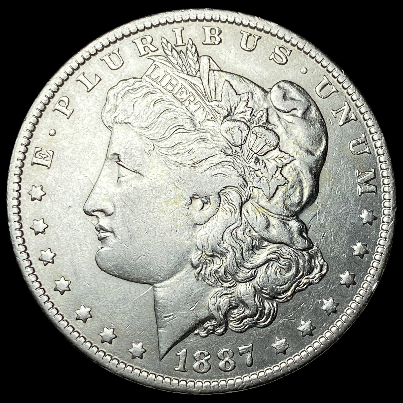 1887-O Silver Morgan Dollar NEARLY UNCIRCULATED (1 of 2)