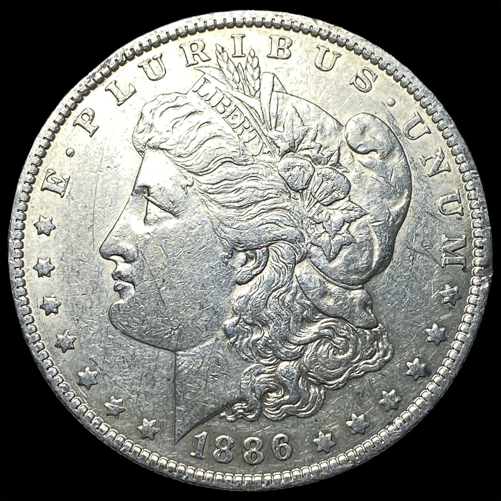 1886-O Silver Morgan Dollar CLOSELY UNCIRCULATED: 1886-O Silver Morgan Dollar CLOSELY UNCIRCULATED