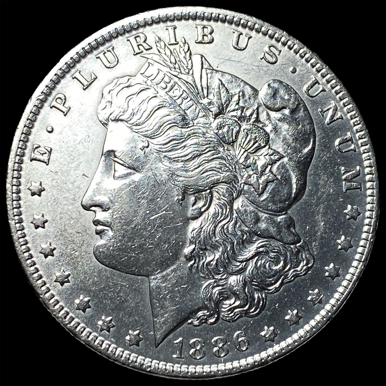 1886 Morgan Silver Dollar CLOSELY UNCIRCULATED: 1886 Morgan Silver Dollar CLOSELY UNCIRCULATED