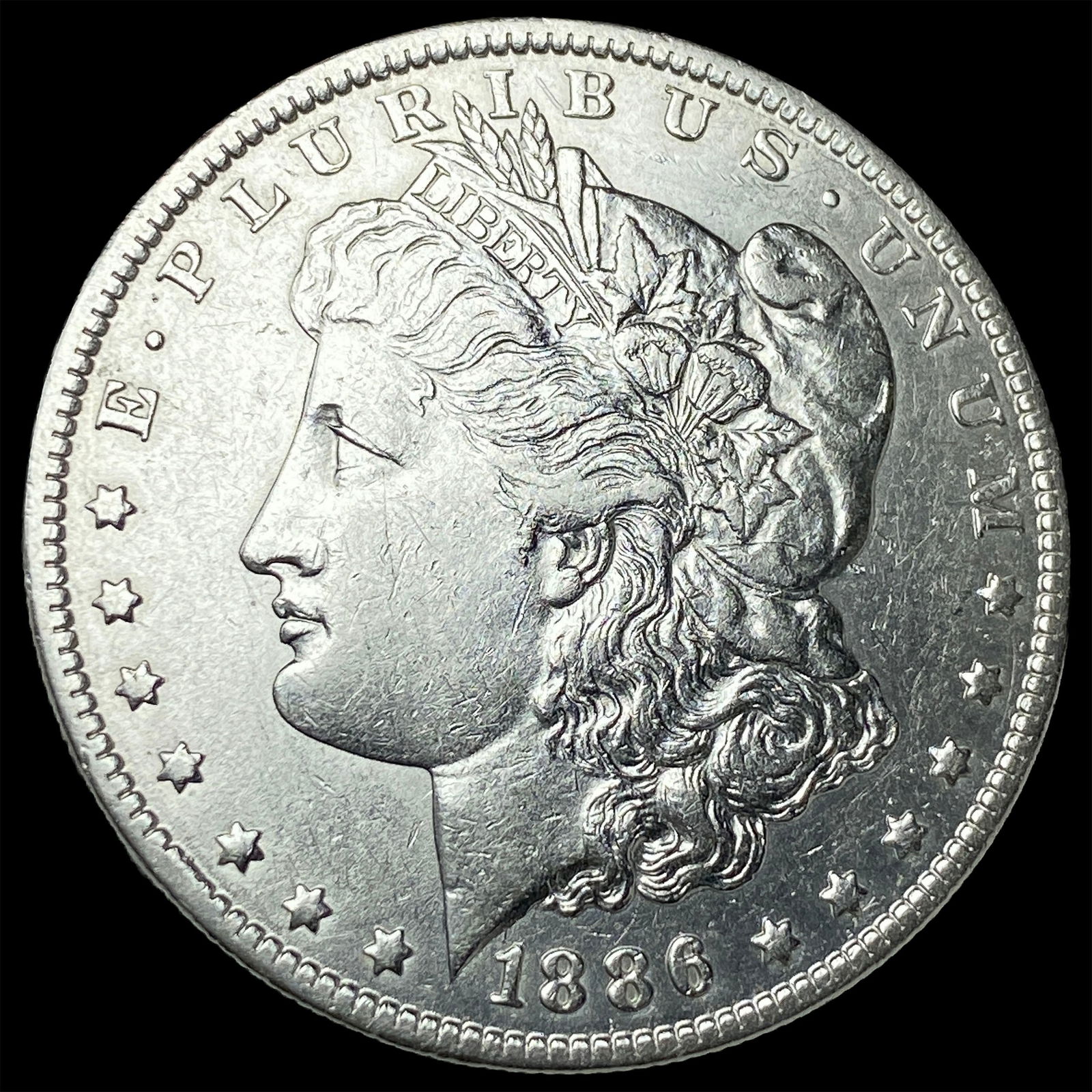1886-O Silver Morgan Dollar CLOSELY UNCIRCULATED: 1886-O Silver Morgan Dollar CLOSELY UNCIRCULATED