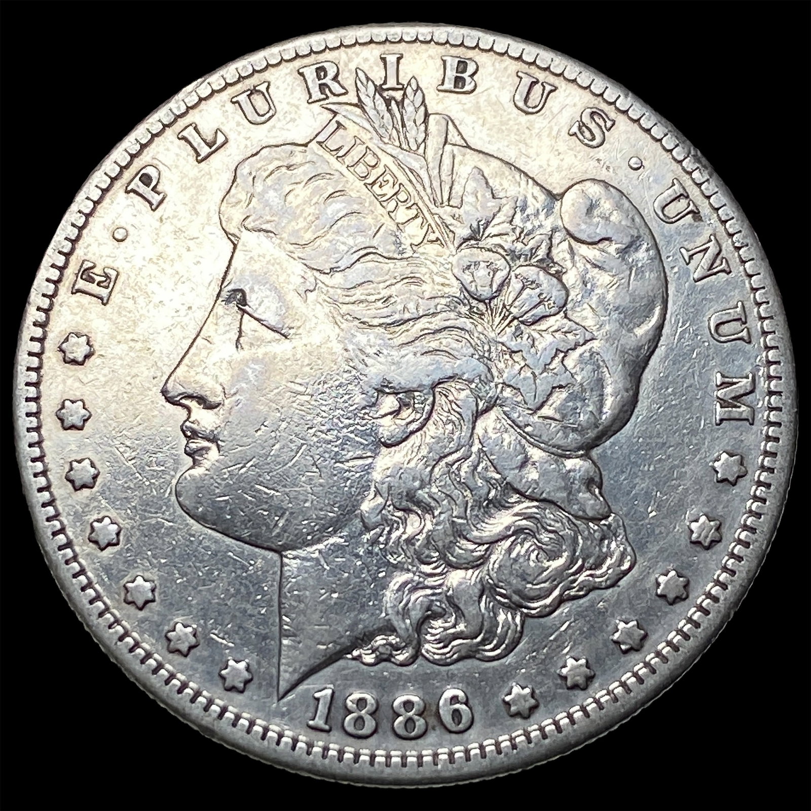 1886-S Silver Morgan Dollar NEARLY UNCIRCULATED (1 of 2)