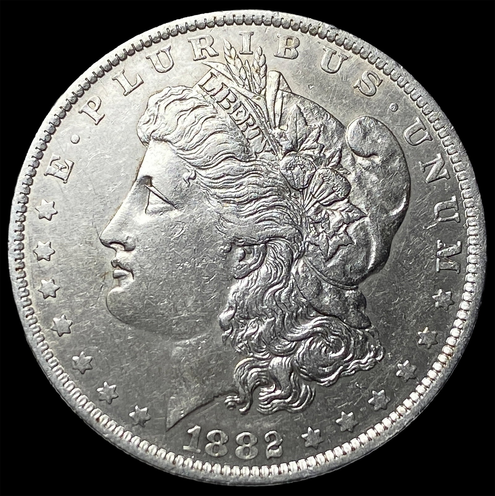 1882-O/S Silver Morgan Dollar CLOSELY UNCIRCULATED (1 of 2)