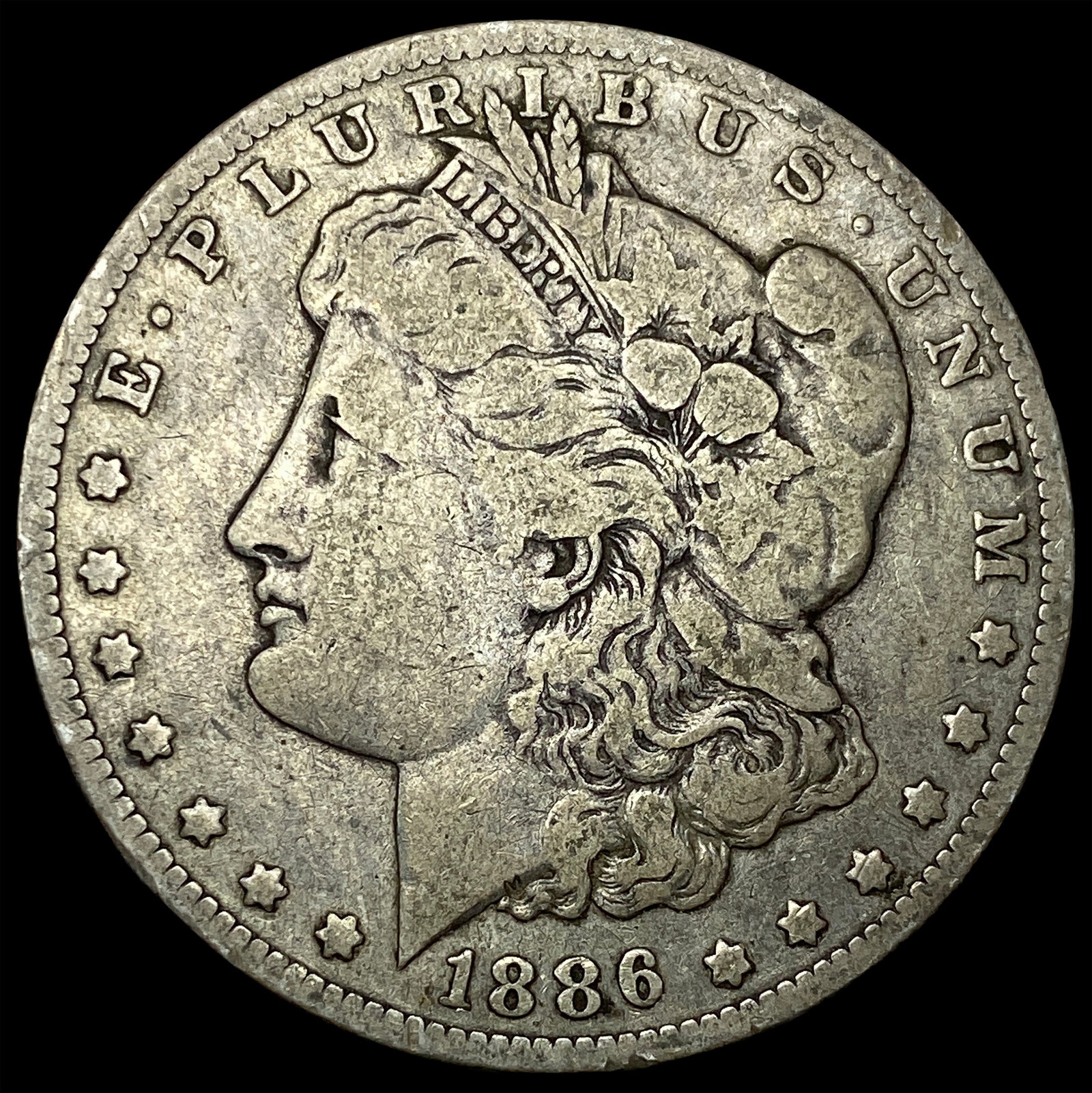 1886-O Silver Morgan Dollar ABOUT UNCIRCULATED (1 of 2)