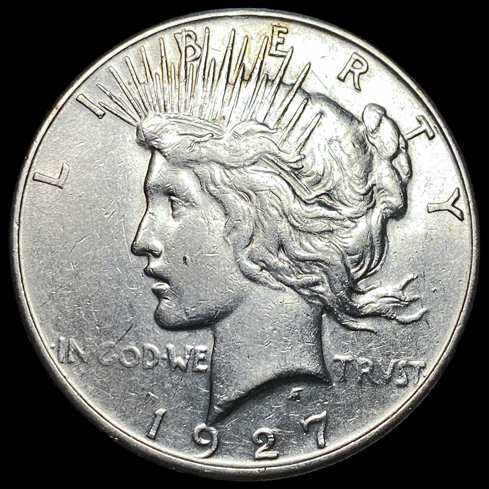 1927 Peace Silver Dollar CLOSELY UNCIRCULATED (1 of 2)
