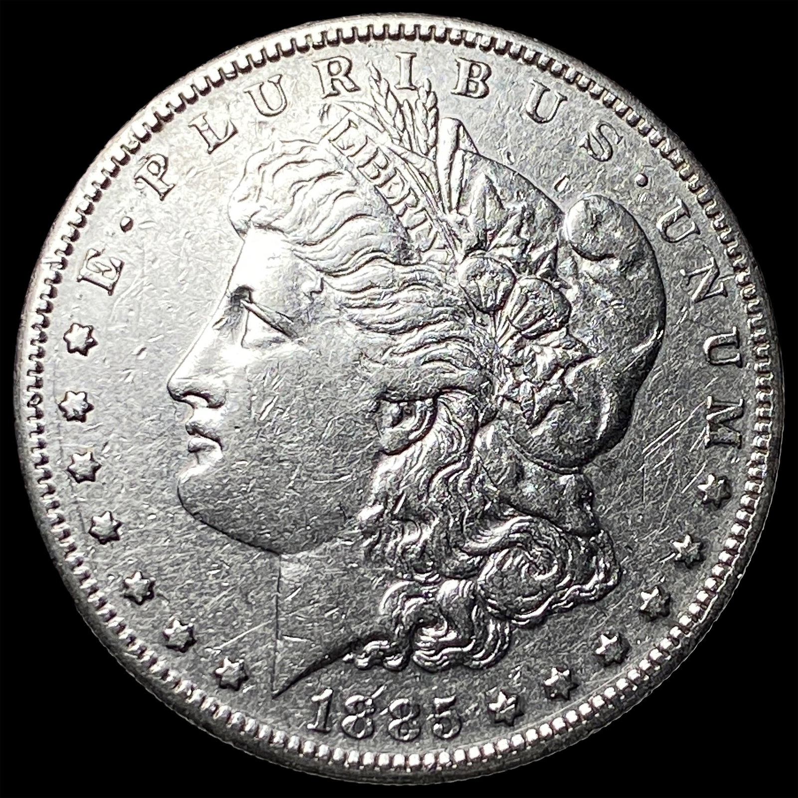 1885-O Silver Morgan Dollar CLOSELY UNCIRCULATED: 1885-O Silver Morgan Dollar CLOSELY UNCIRCULATED