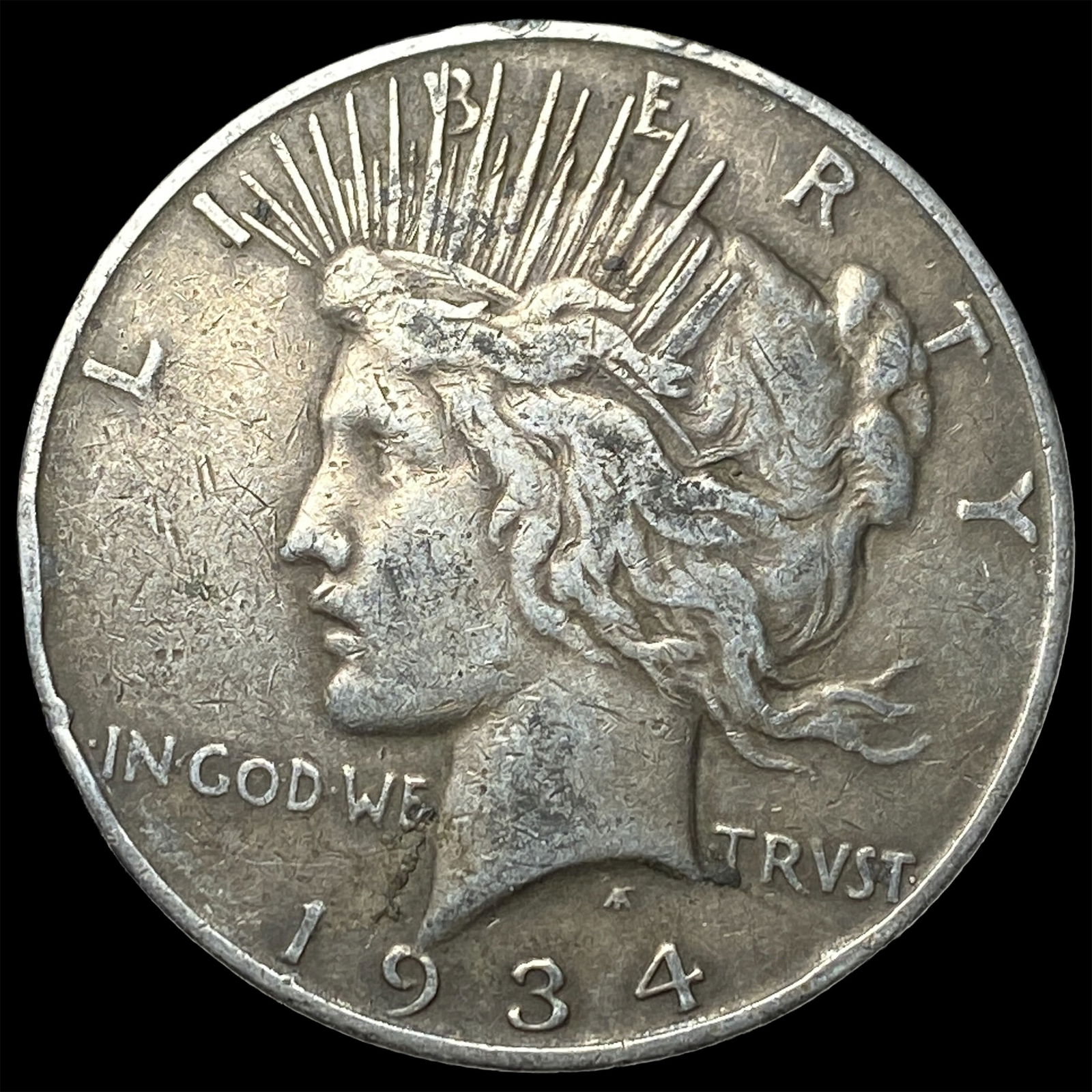 1934 Peace Silver Dollar ABOUT UNCIRCULATED (1 of 2)
