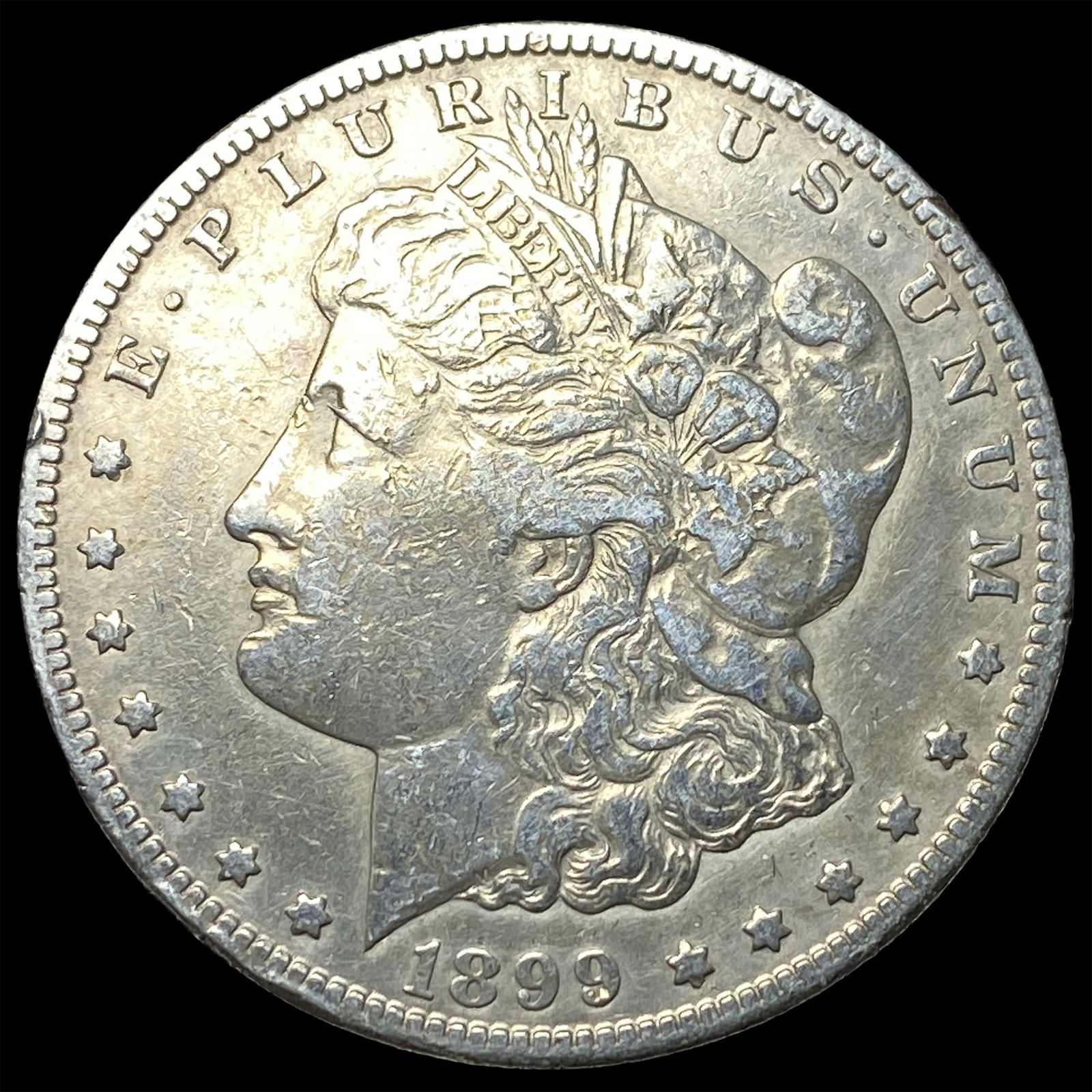 1899-S Silver Morgan Dollar ABOUT UNCIRCULATED: 1899-S Silver Morgan Dollar ABOUT UNCIRCULATED