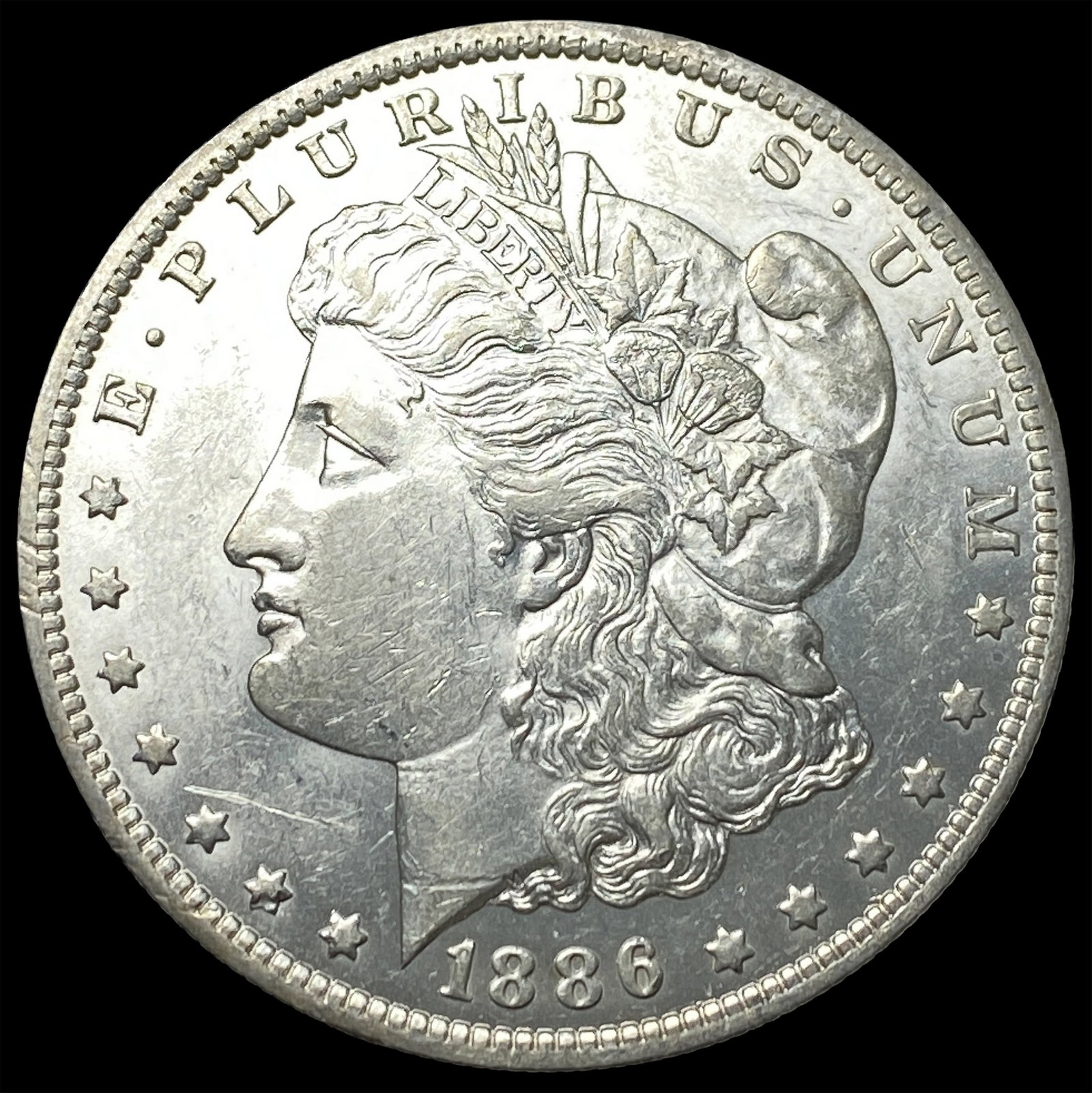 1886-O Silver Morgan Dollar CLOSELY UNCIRCULATED: 1886-O Silver Morgan Dollar CLOSELY UNCIRCULATED