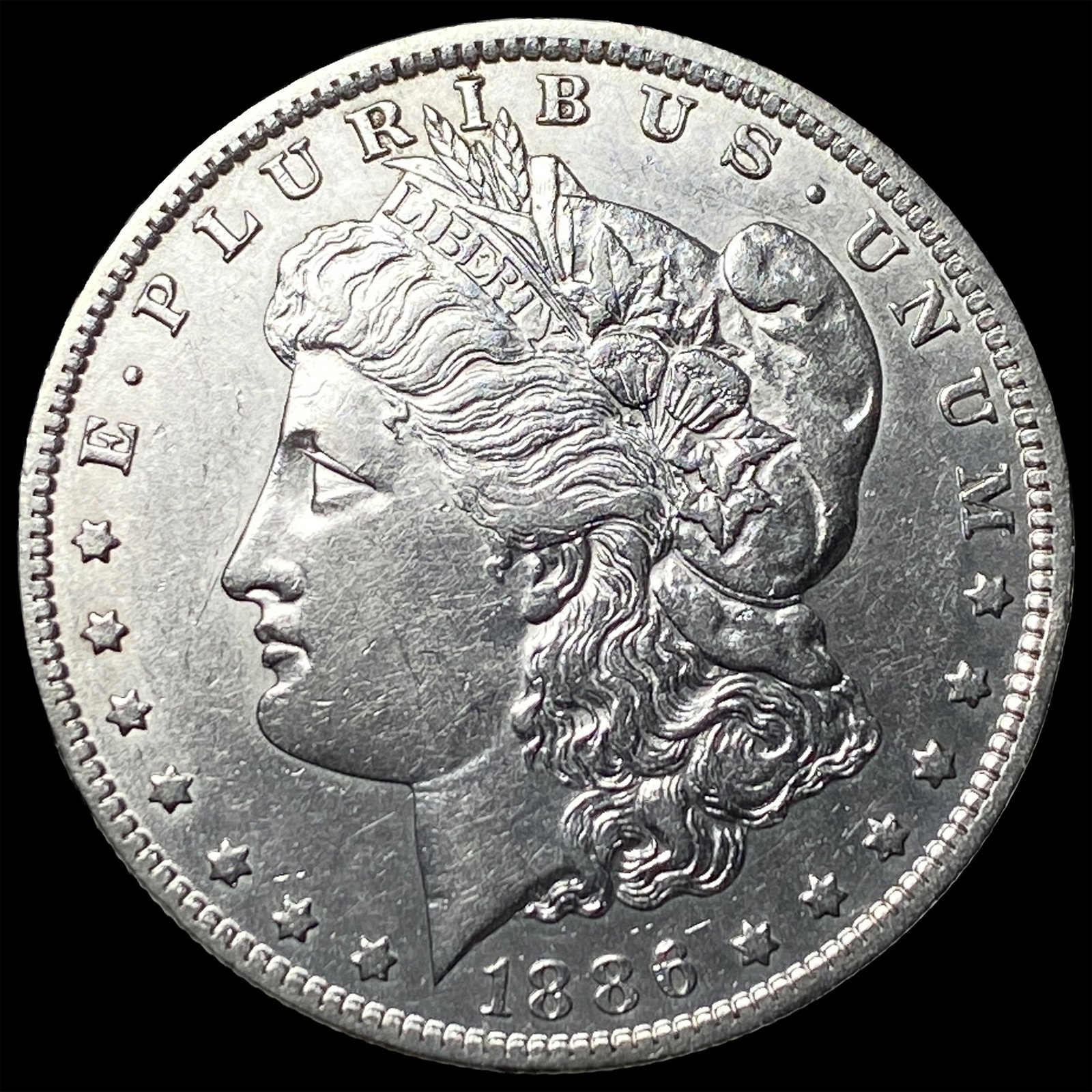 1886-O Silver Morgan Dollar CLOSELY UNCIRCULATED: 1886-O Silver Morgan Dollar CLOSELY UNCIRCULATED