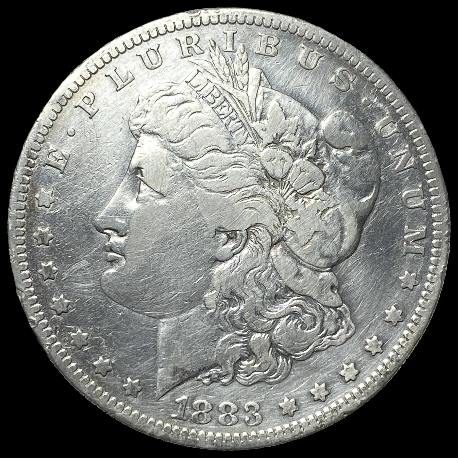 1883-S Silver Morgan Dollar ABOUT UNCIRCULATED: 1883-S Silver Morgan Dollar ABOUT UNCIRCULATED