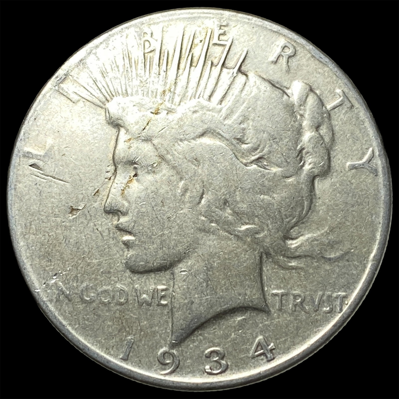 1934 Peace Silver Dollar ABOUT UNCIRCULATED (1 of 2)