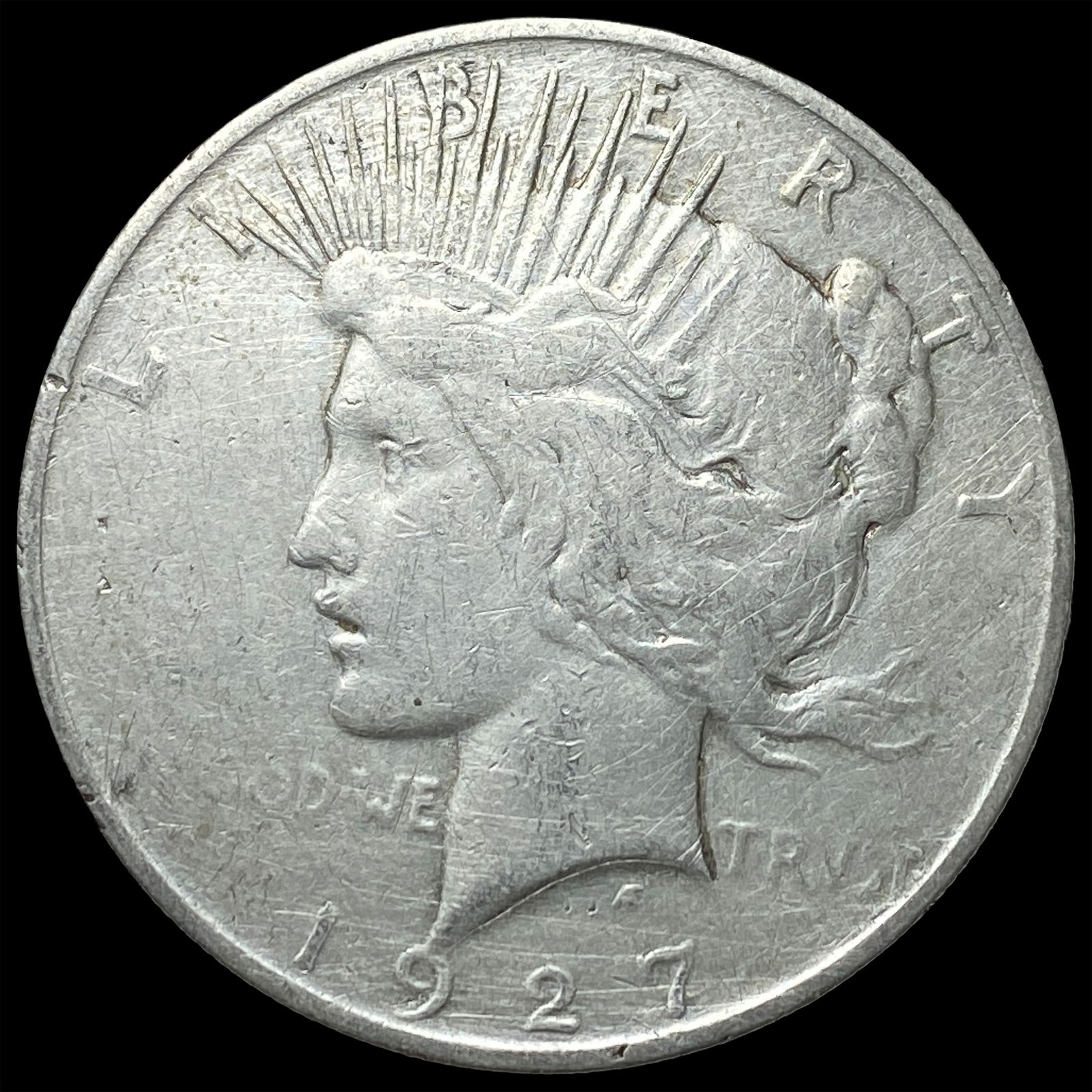 1927 Peace Silver Dollar ABOUT UNCIRCULATED: 1927 Peace Silver Dollar ABOUT UNCIRCULATED