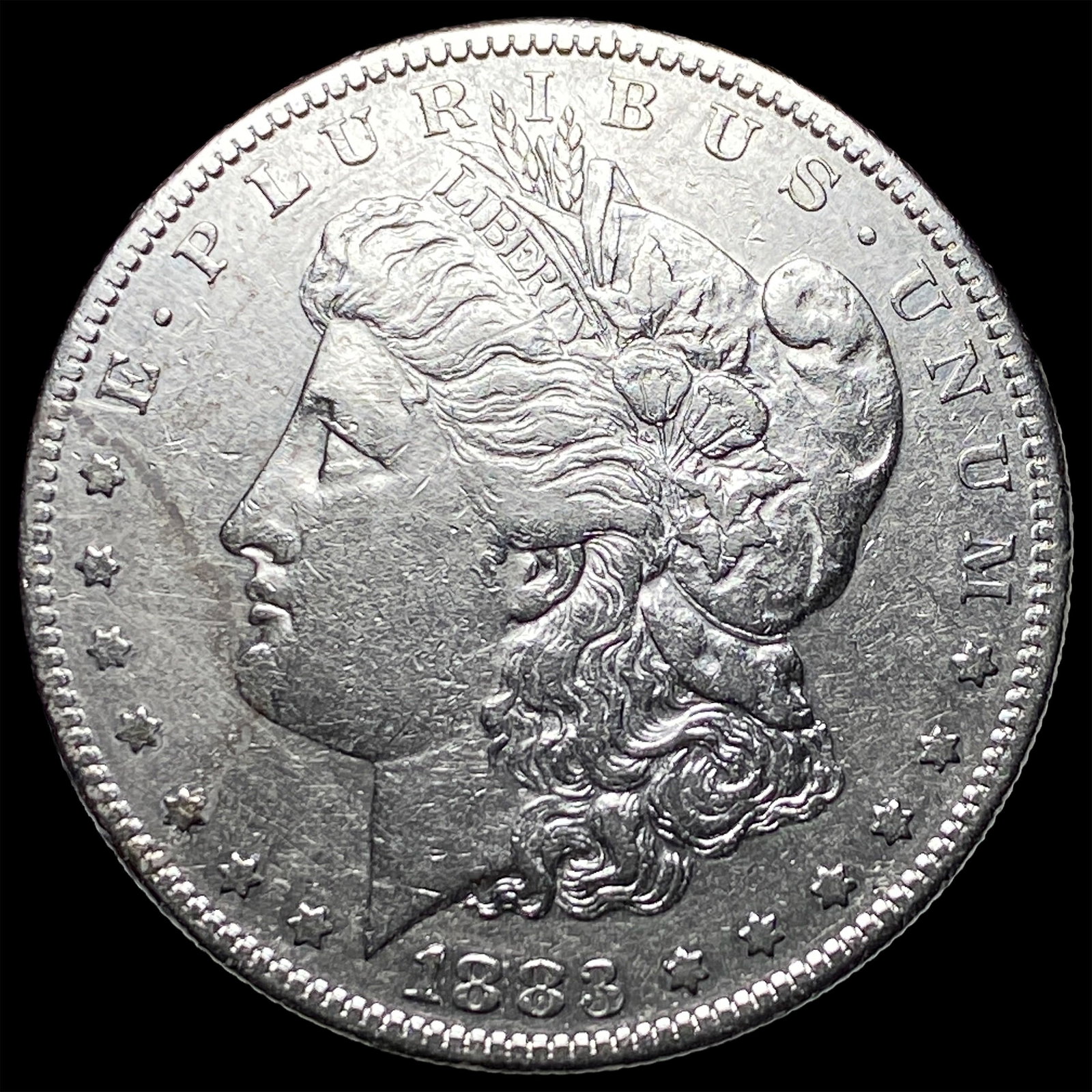 1883-S Morgan Silver Dollar NEARLY UNCIRCULATED (1 of 2)