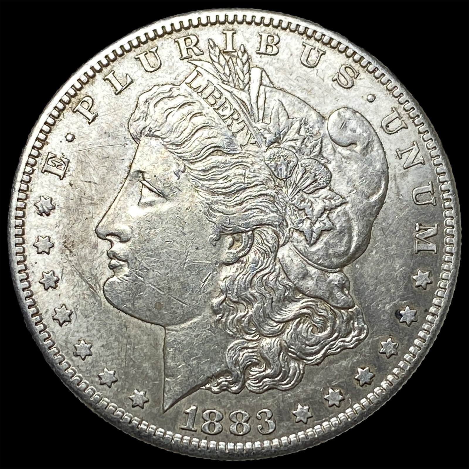 1883-S Silver Morgan Dollar CLOSELY UNCIRCULATED: 1883-S Silver Morgan Dollar CLOSELY UNCIRCULATED
