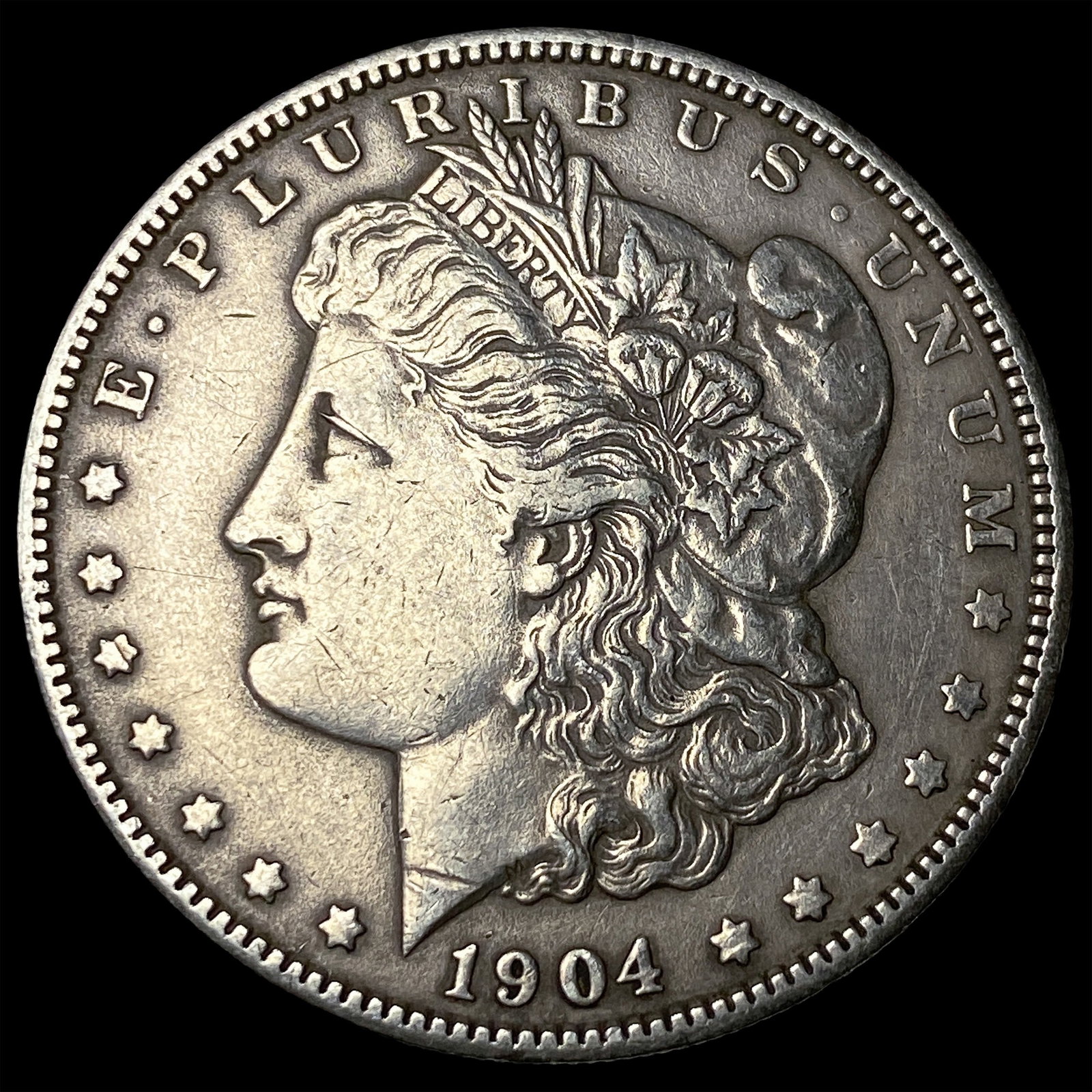 1904 Silver Morgan Dollar CLOSELY UNCIRCULATED (1 of 2)
