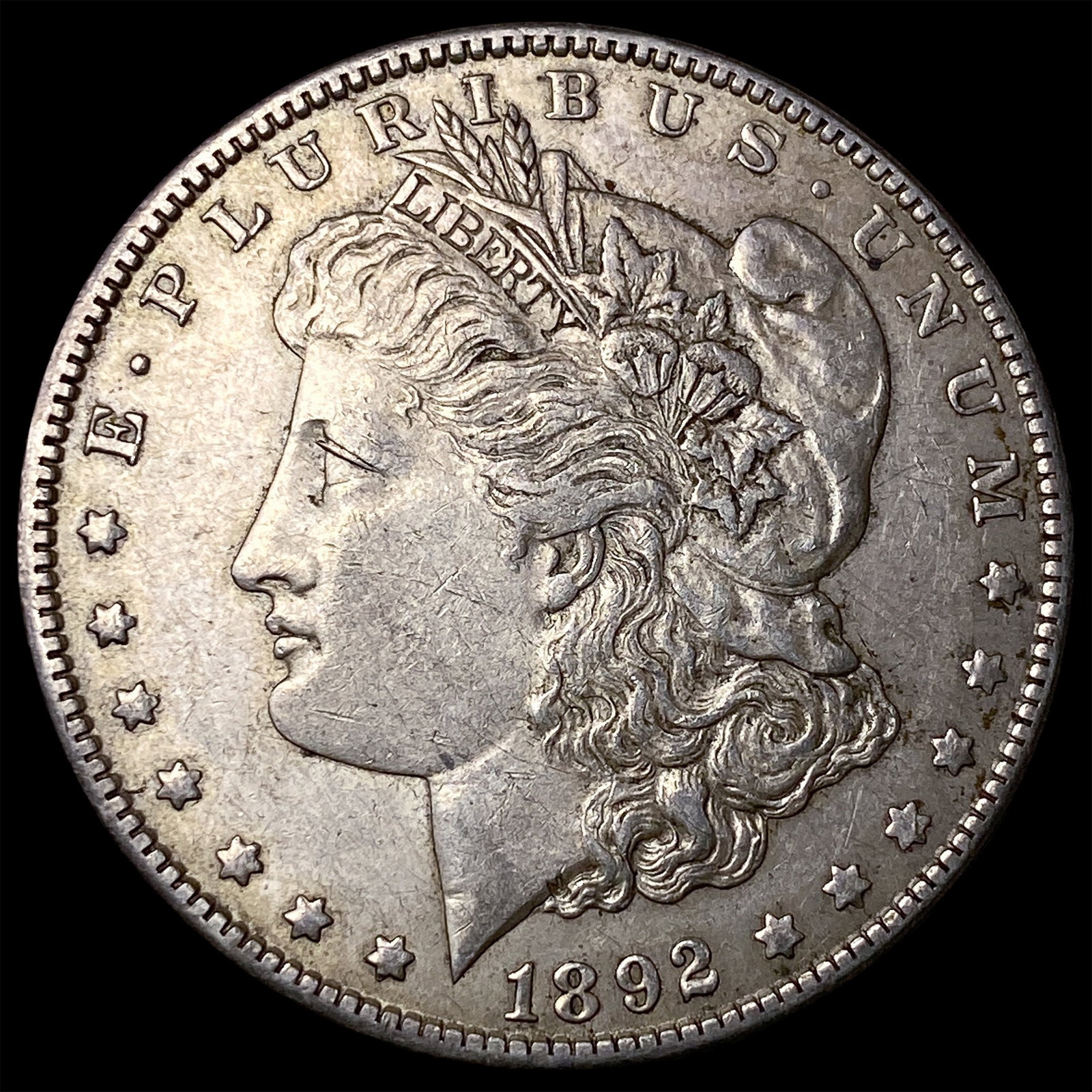 1892-O Silver Morgan Dollar CLOSELY UNCIRCULATED: 1892-O Silver Morgan Dollar CLOSELY UNCIRCULATED