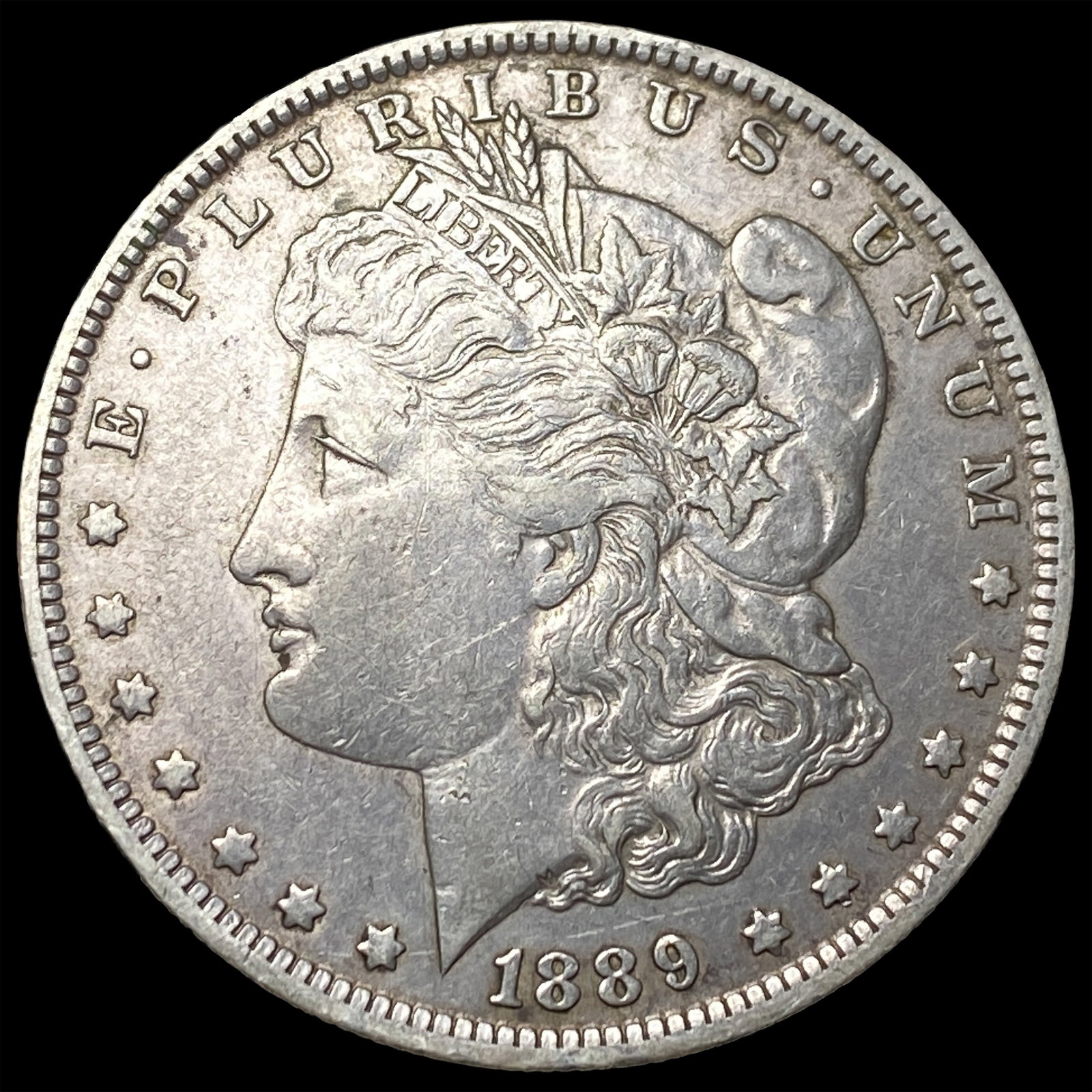 1889-O Silver Morgan Dollar NEARLY UNCIRCULATED (1 of 2)