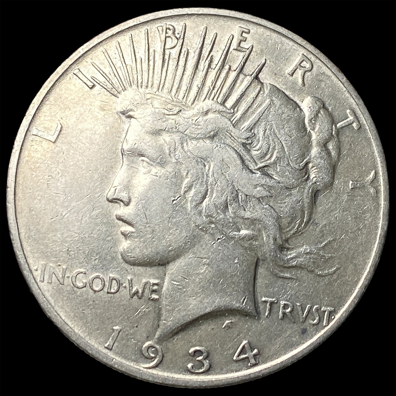 1934-D Silver Peace Dollar ABOUT UNCIRCULATED: 1934-D Silver Peace Dollar ABOUT UNCIRCULATED