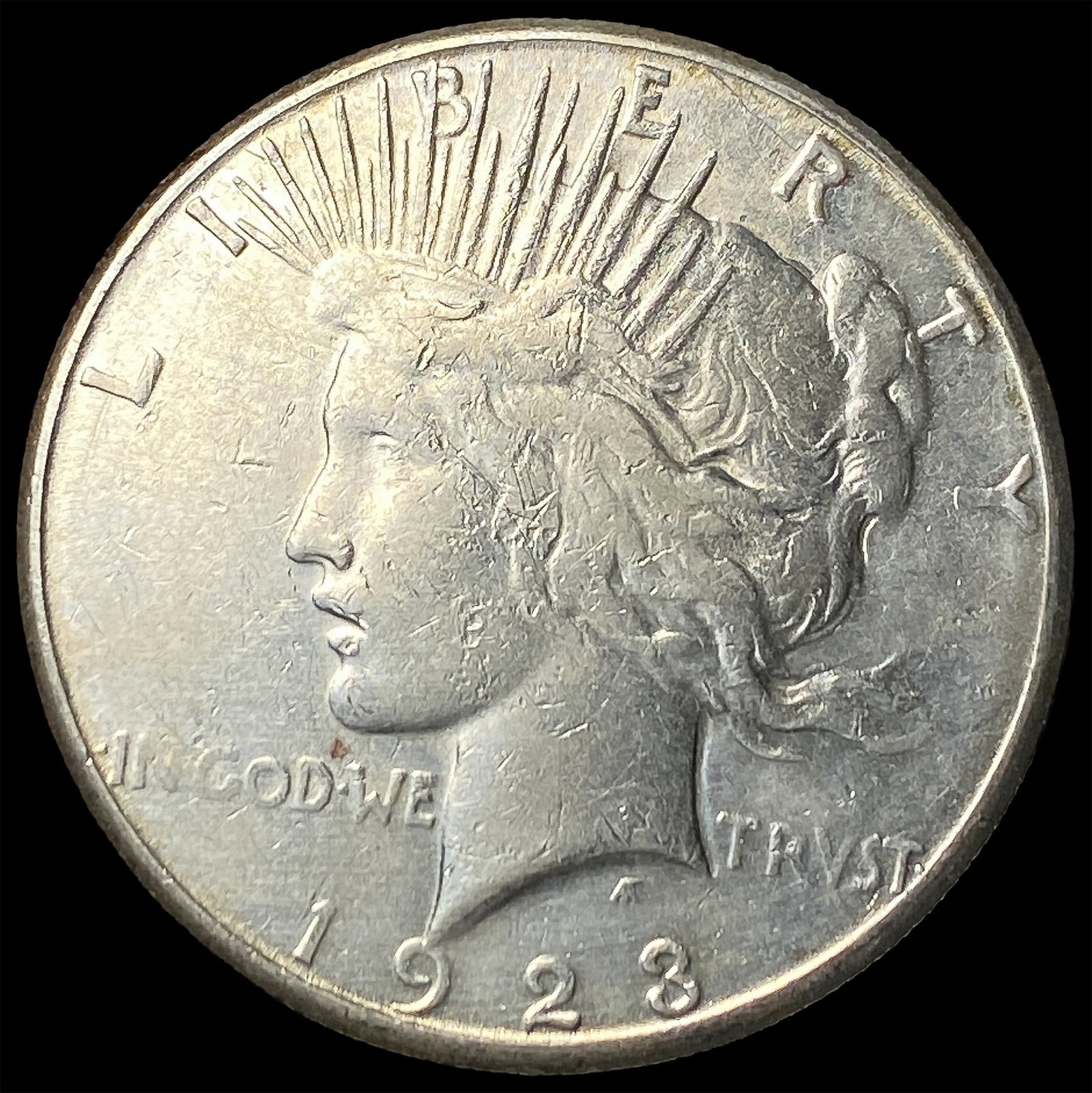 1923-S Silver Peace Dollar NEARLY UNCIRCULATED (1 of 2)
