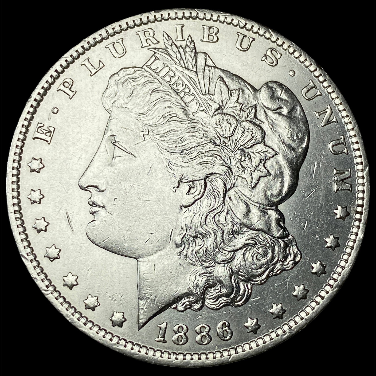 1886-O Silver Morgan Dollar CLOSELY UNCIRCULATED: 1886-O Silver Morgan Dollar CLOSELY UNCIRCULATED