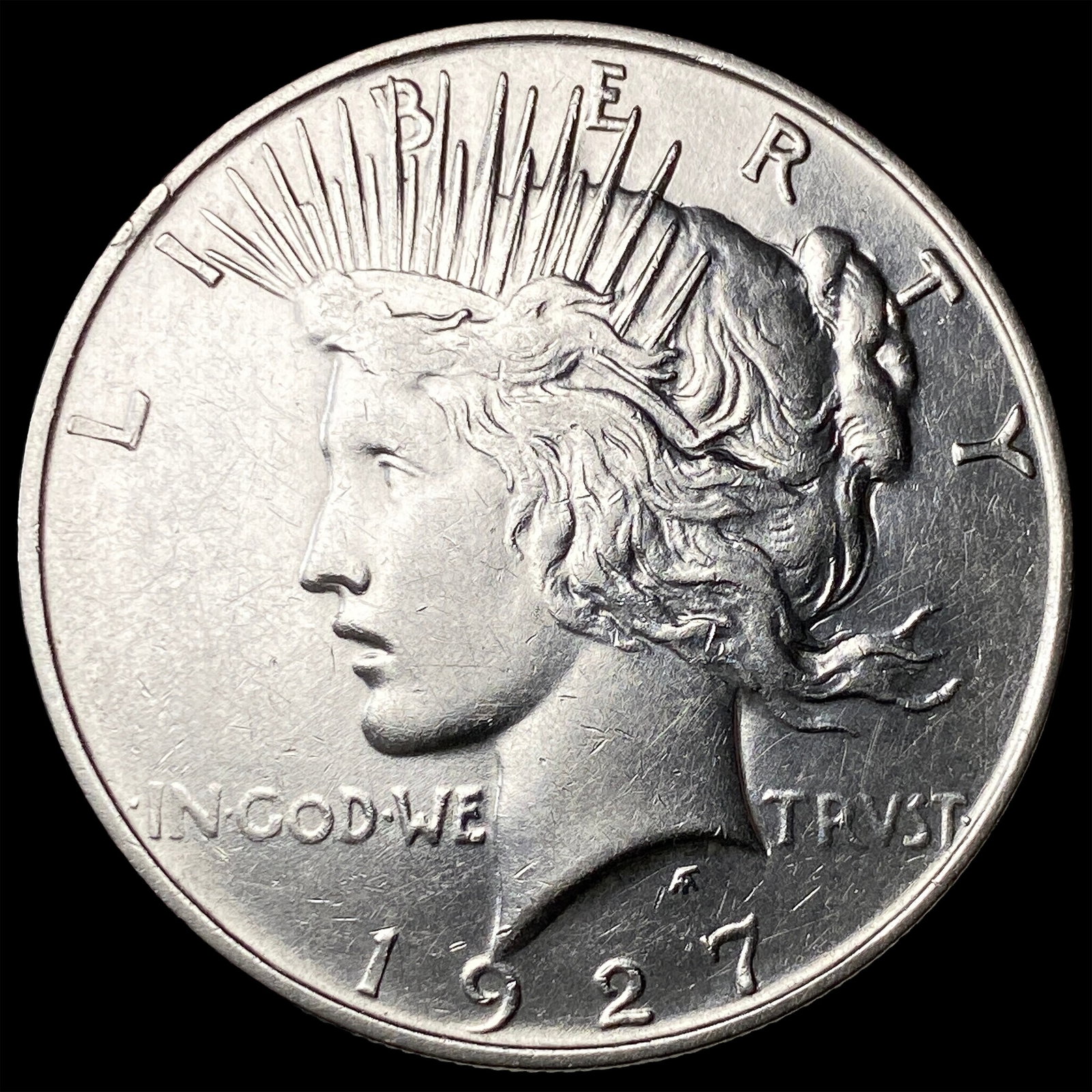 1927-D Peace Silver Dollar CLOSELY UNCIRCULATED: 1927-D Peace Silver Dollar CLOSELY UNCIRCULATED