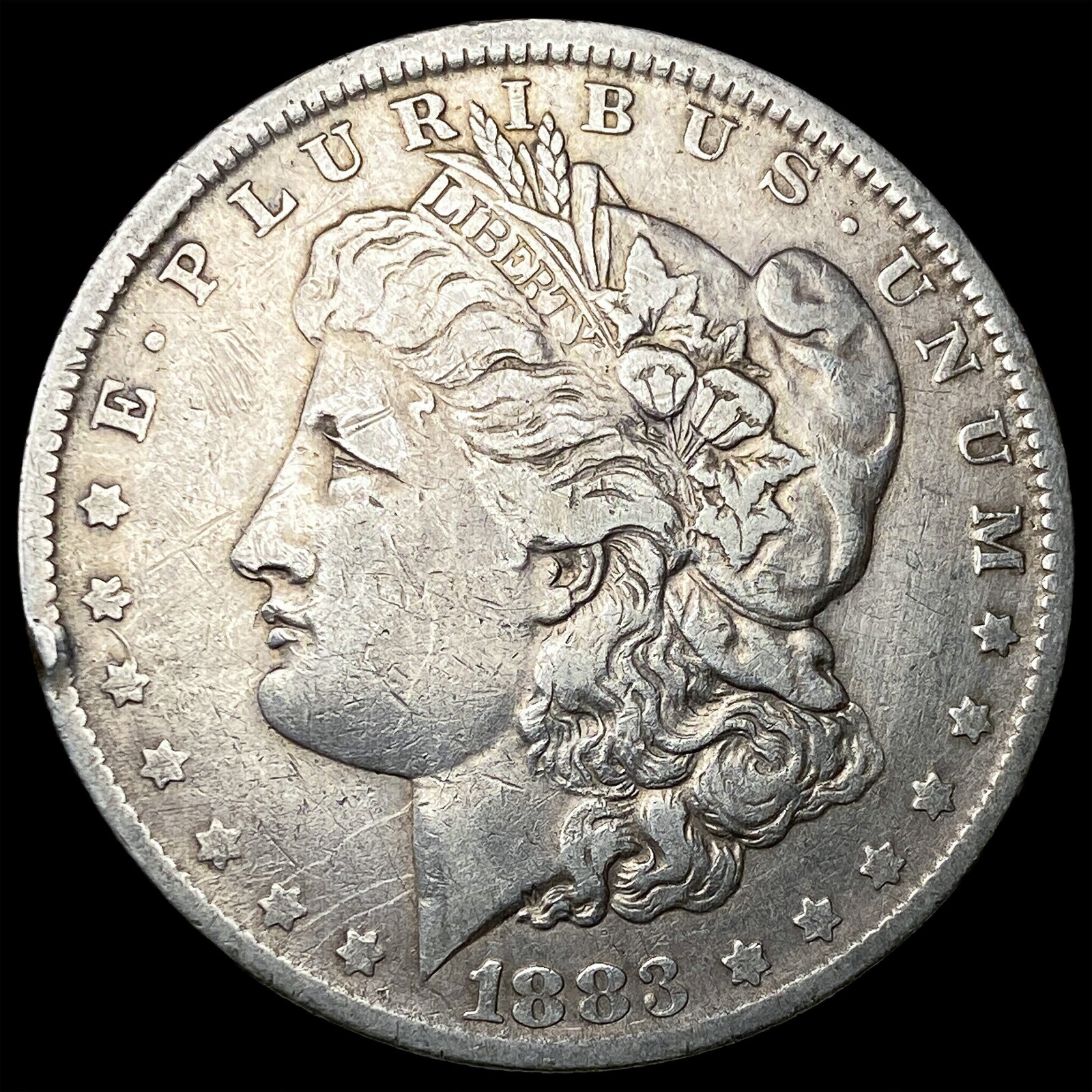 1883-O Silver Morgan Dollar ABOUT UNCIRCULATED (1 of 2)