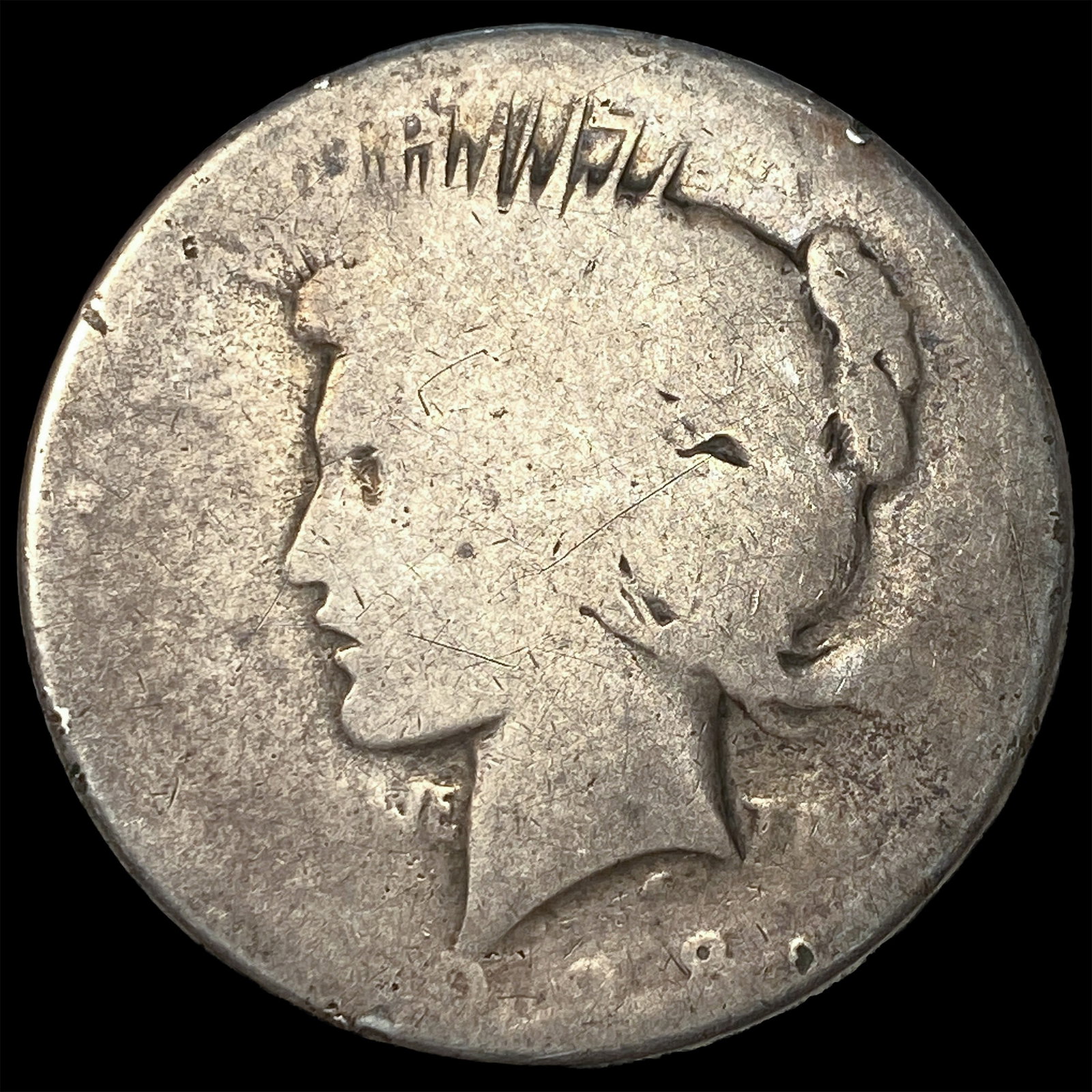 This is a heavily worn 1921 Peace Dollar. NICELY CIRCULATED: This is a heavily worn 1921 Peace Dollar. NICELY CIRCULATED