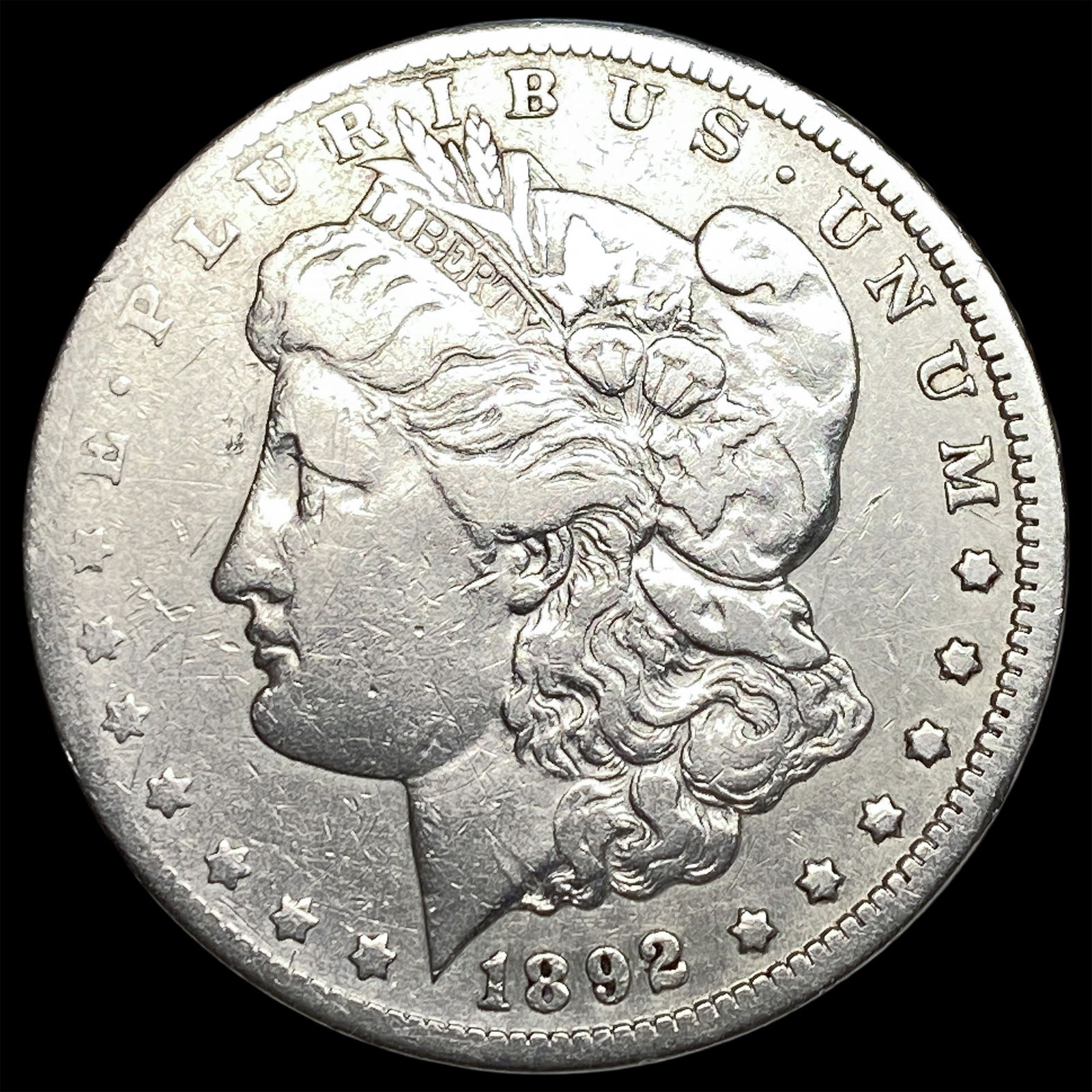 1892-CC Silver Morgan Dollar NEARLY UNCIRCULATED (1 of 2)