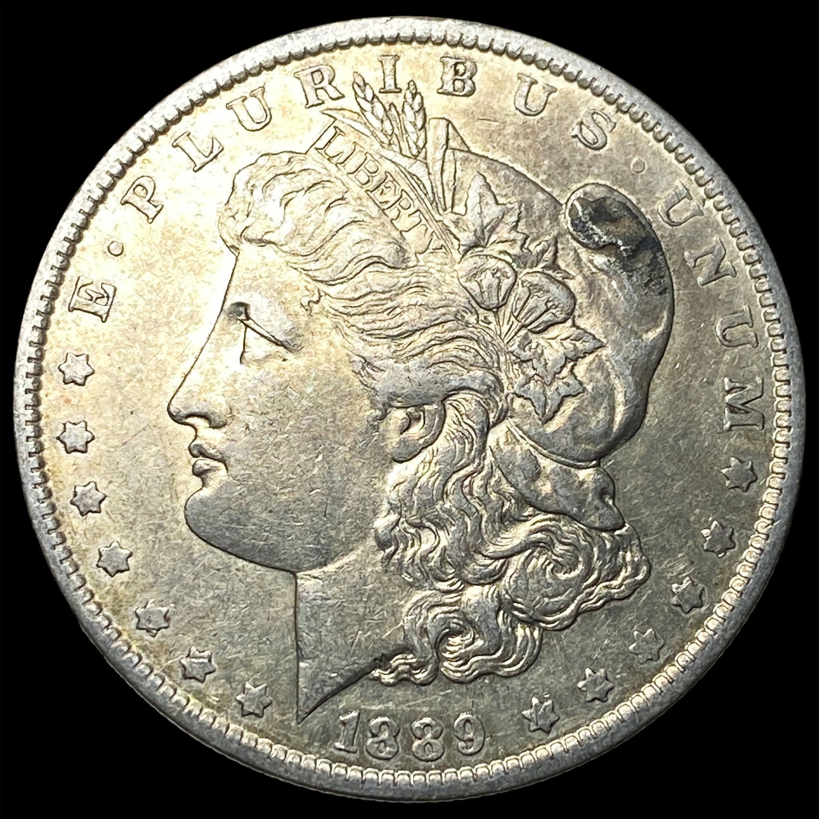 1889-O Silver Morgan Dollar NEARLY UNCIRCULATED (1 of 2)