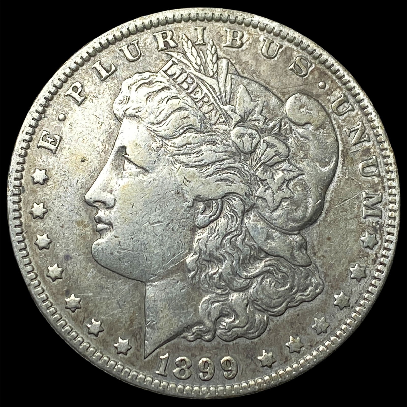1899 Morgan Silver Dollar NEARLY UNCIRCULATED (1 of 2)