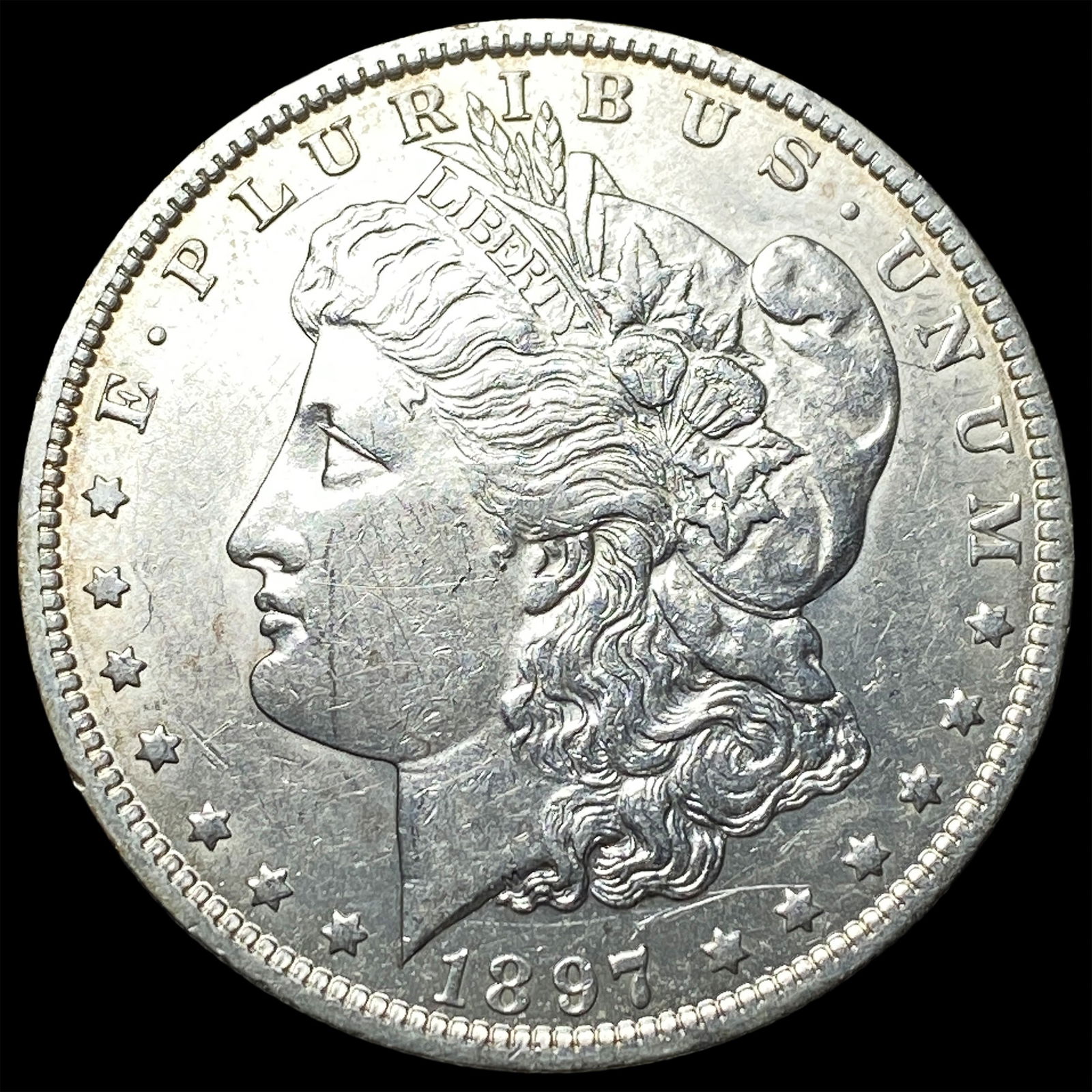 1897-O Silver Morgan Dollar CLOSELY UNCIRCULATED: 1897-O Silver Morgan Dollar CLOSELY UNCIRCULATED