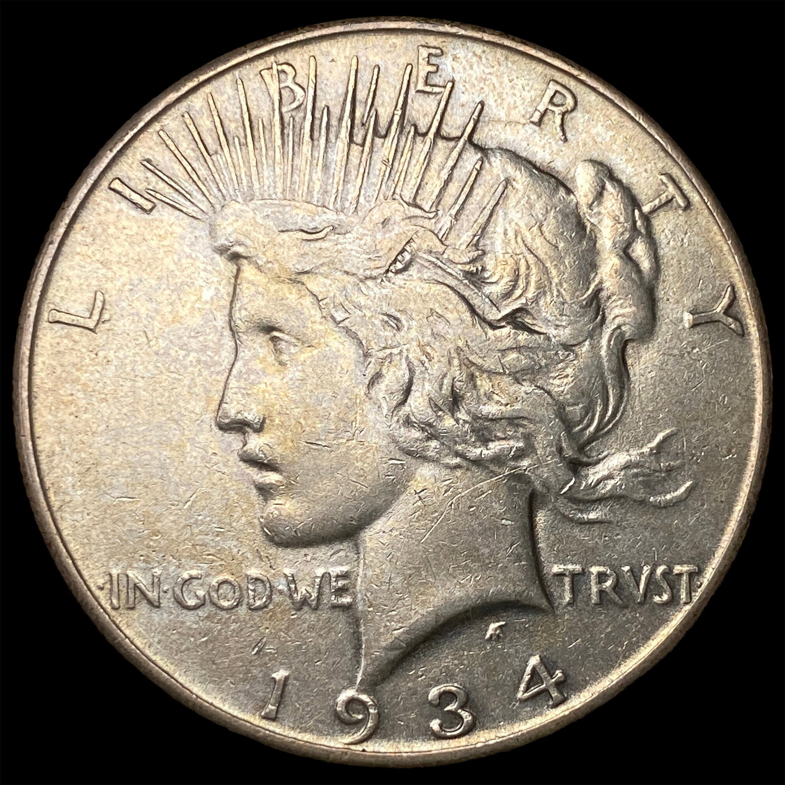1934 Silver Peace Dollar ABOUT UNCIRCULATED (1 of 2)