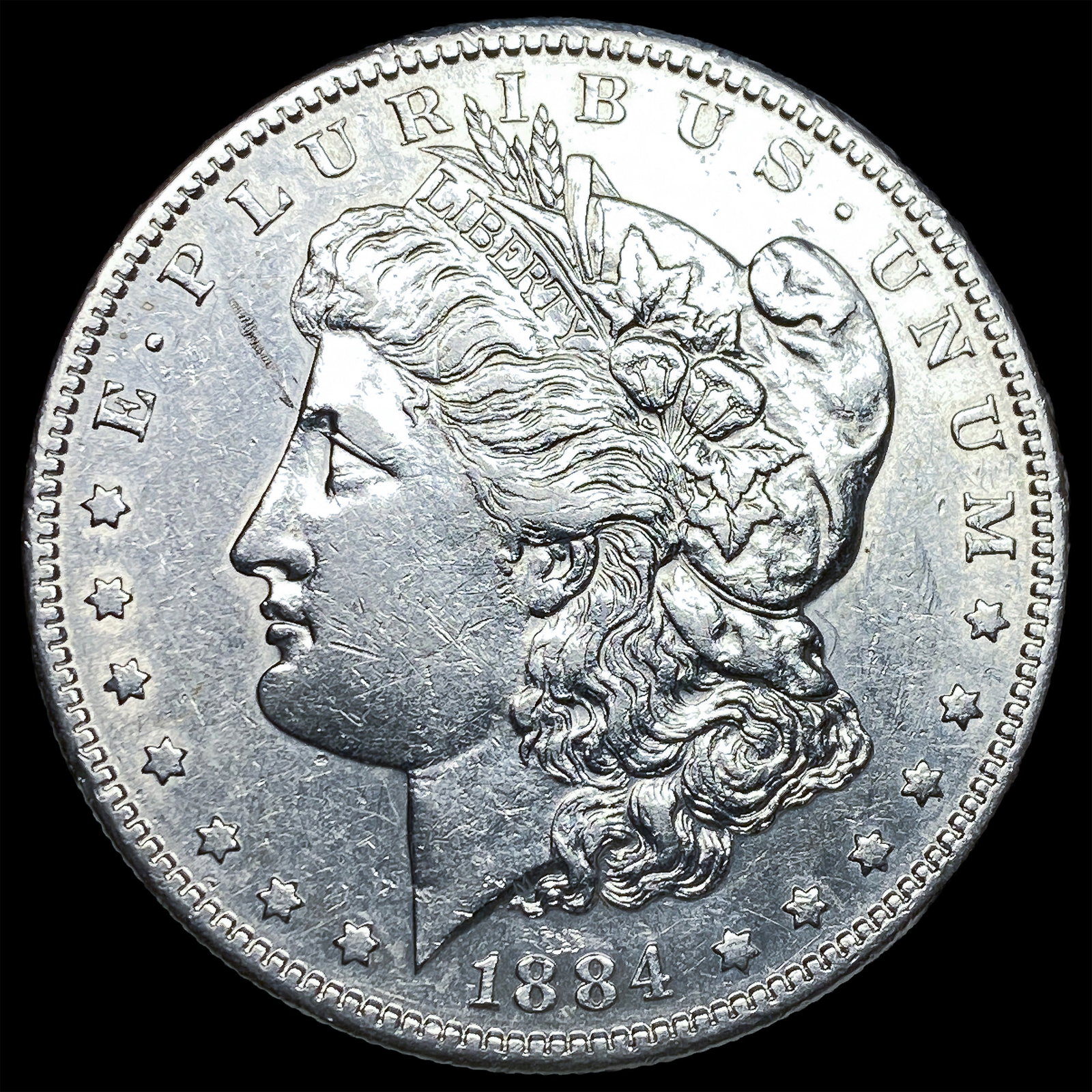 1884-S Silver Morgan Dollar ABOUT UNCIRCULATED: 1884-S Silver Morgan Dollar ABOUT UNCIRCULATED
