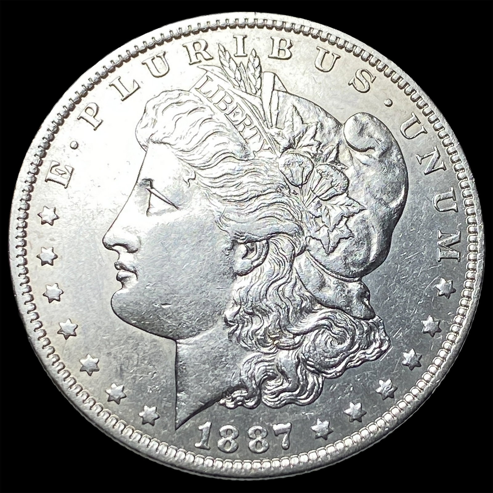 1887-O Silver Morgan Dollar NEARLY UNCIRCULATED: 1887-O Silver Morgan Dollar NEARLY UNCIRCULATED